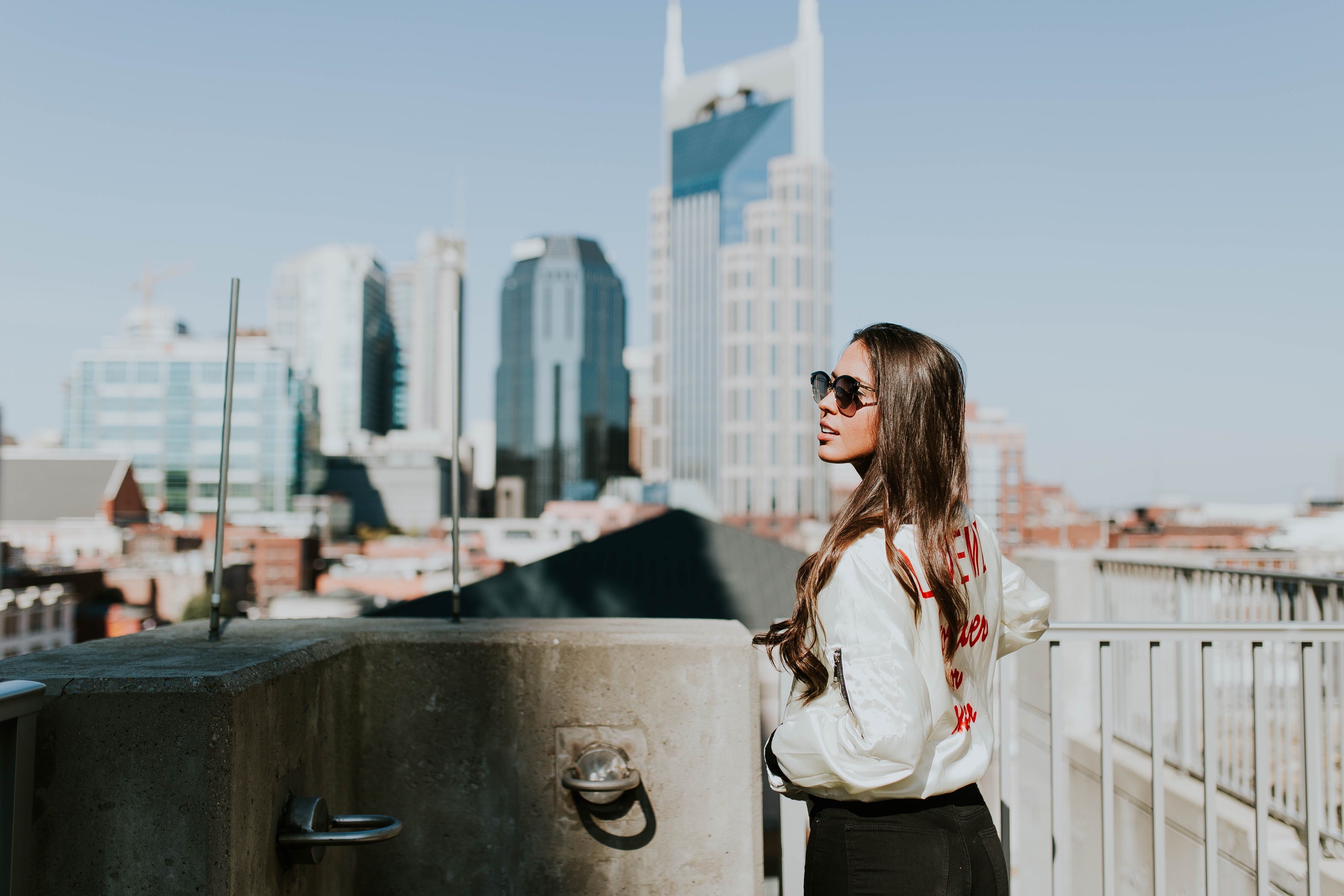 young Women, front, cheerful, 5K, sky, architecture, office building exterior, smiling, selective focus, hair, building exterior, real people, photography, HD Wallpaper