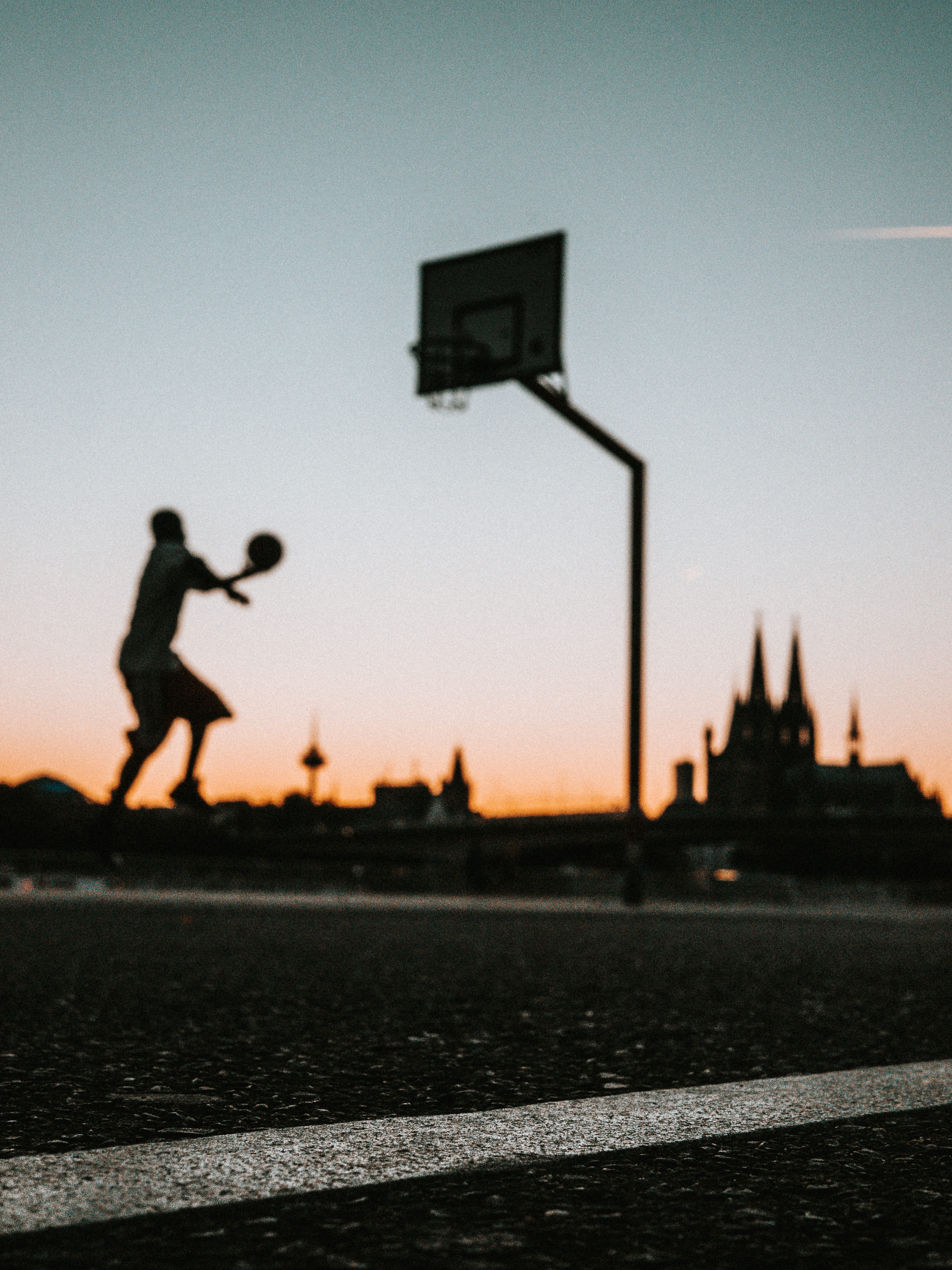 young Adult, jump, two People, fun, silhouette, ball, court, men, sky, near, urban, street, sport, portable, outdoors, lifestyles, line, people, holding, Phone HD Wallpaper