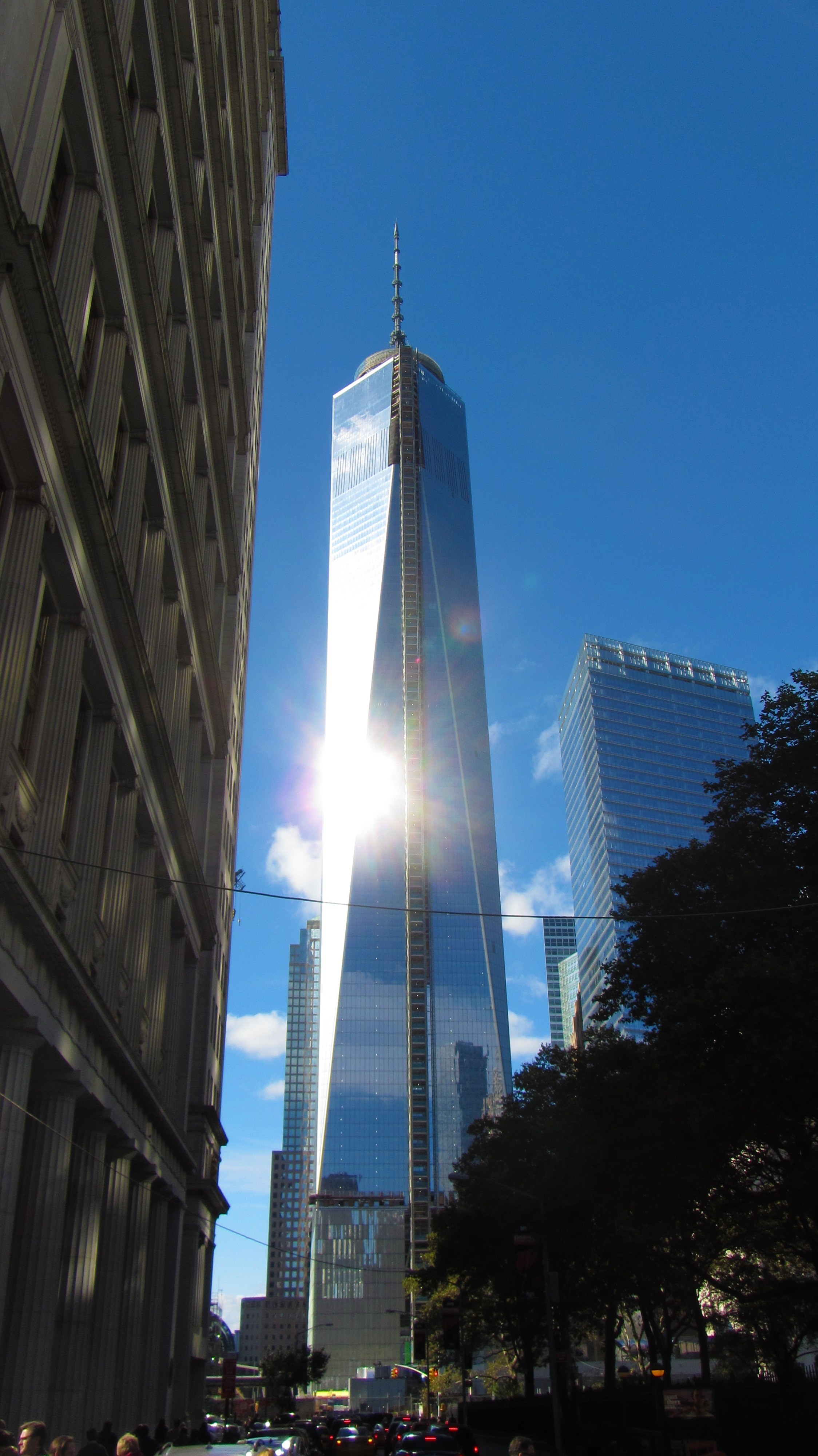 skyscraper, city, ny, lens flare, low angle view, tall - high, sunbeam, clear sky, no people, world trade center, building exterior, sky, nyc, nature, office, Phone HD Wallpaper
