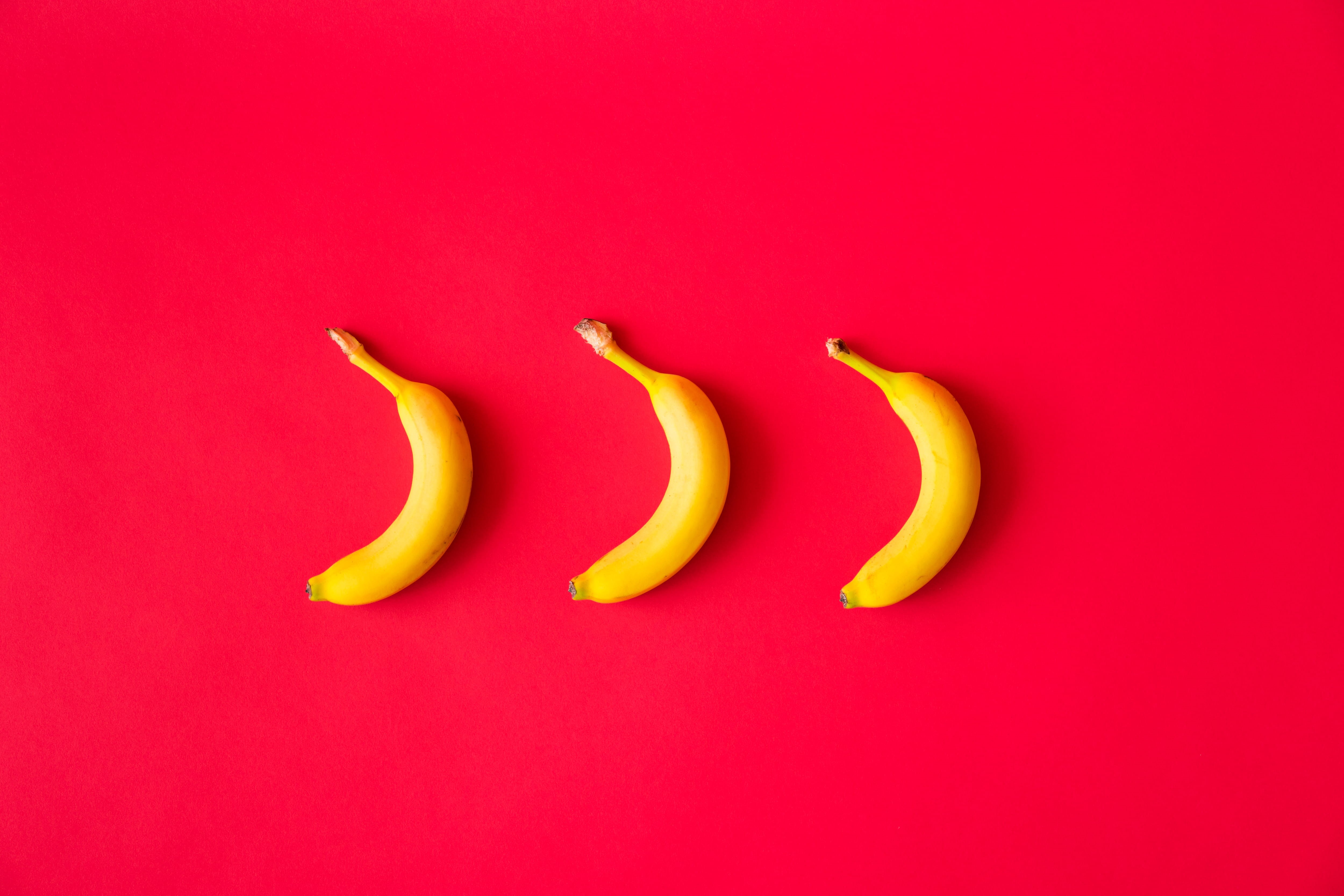 still life, copy space, ripe, red background, 4K, foodie, yellow, food and drink, food, triple, freshness, flat, snack, no people, indoors, vitamins, three objects, HD Wallpaper