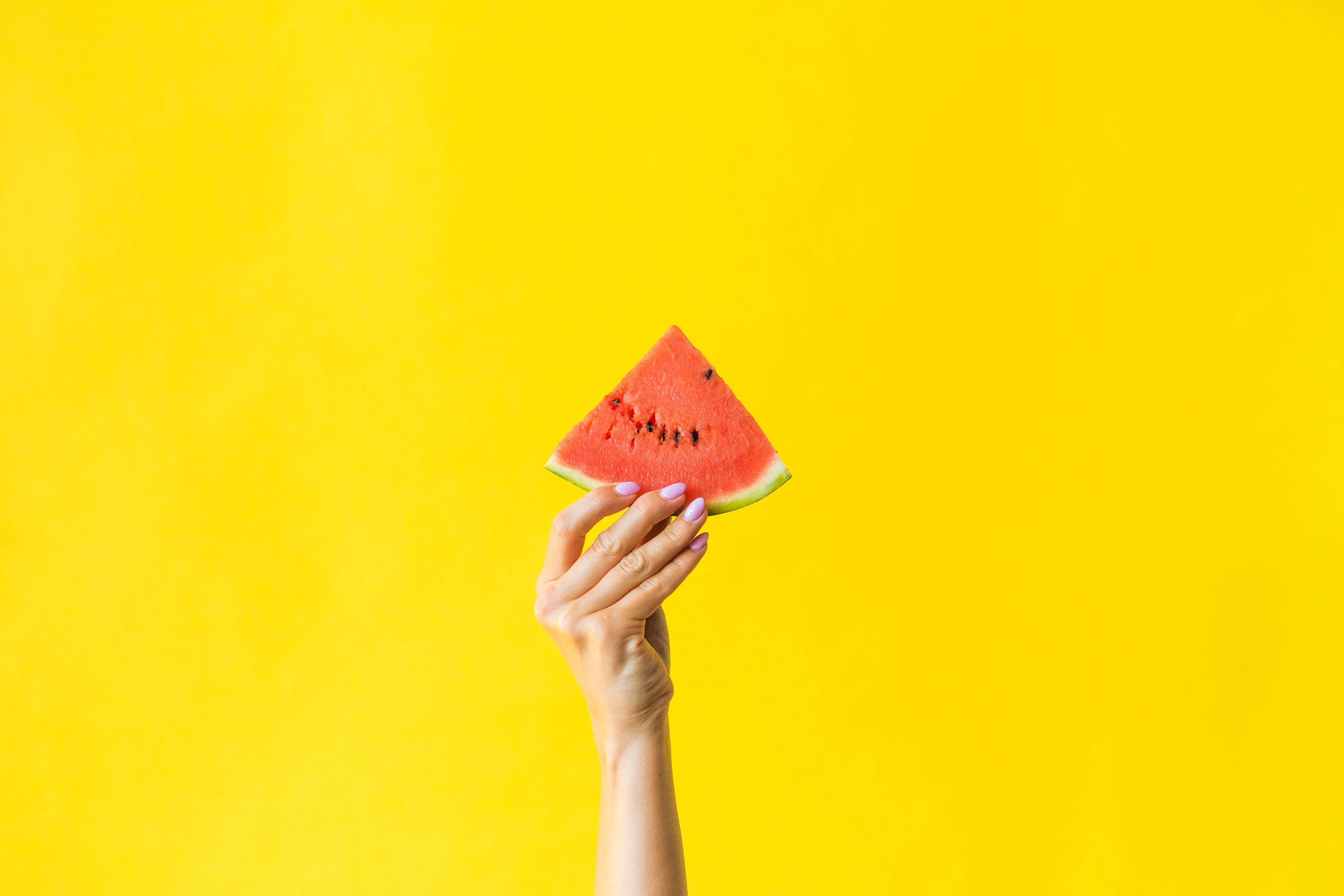 watermelon, yellow, close-up, vitamins, sweet, healthy eating, yellow background, woman, yummy, colored background, holding, summer, background, single object, HD Wallpaper