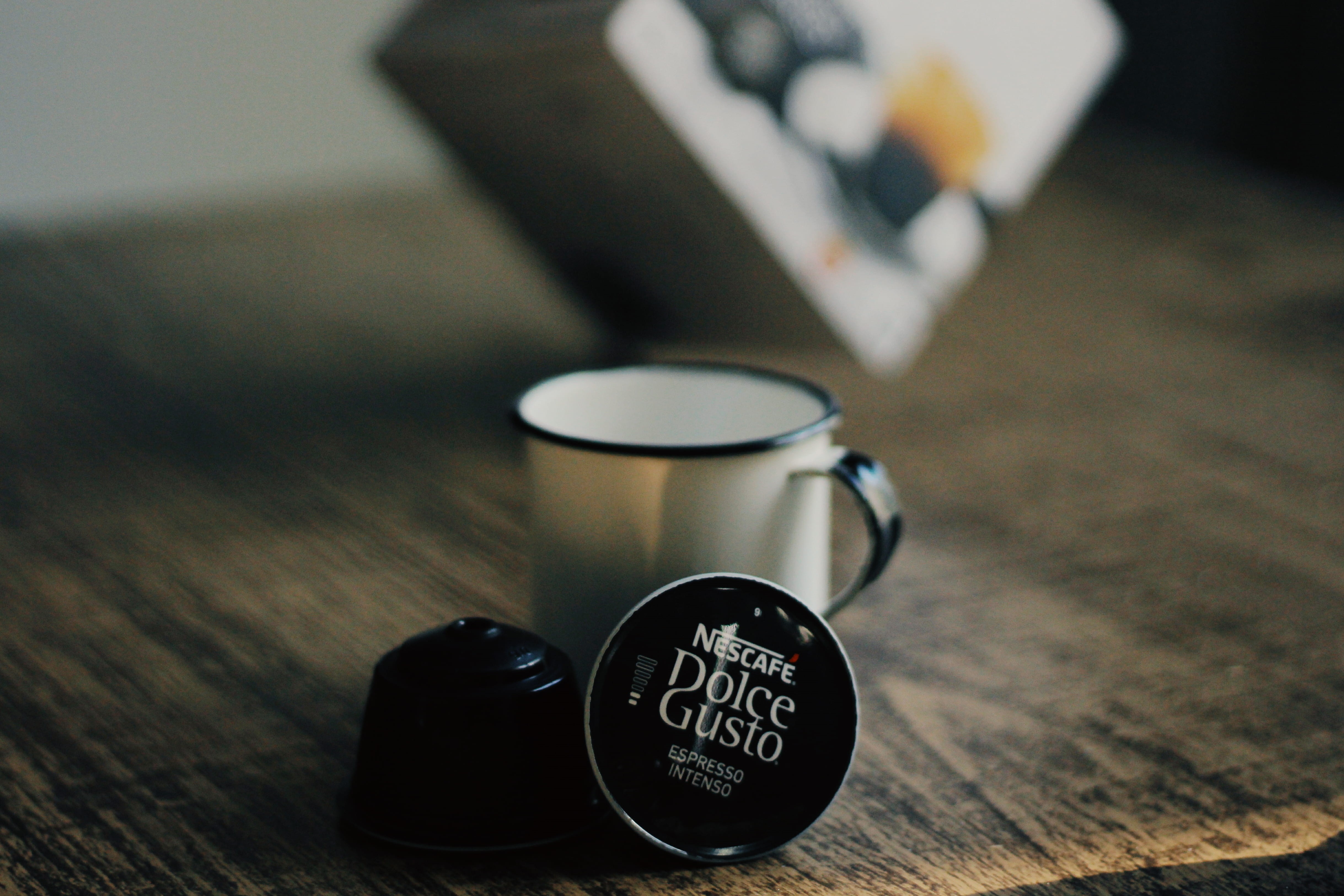 nescafe, cup, group of objects, indoors, coffee, wood - material, high angle view, drink, small group of objects, communication, close-up, table, shadow, HD Wallpaper