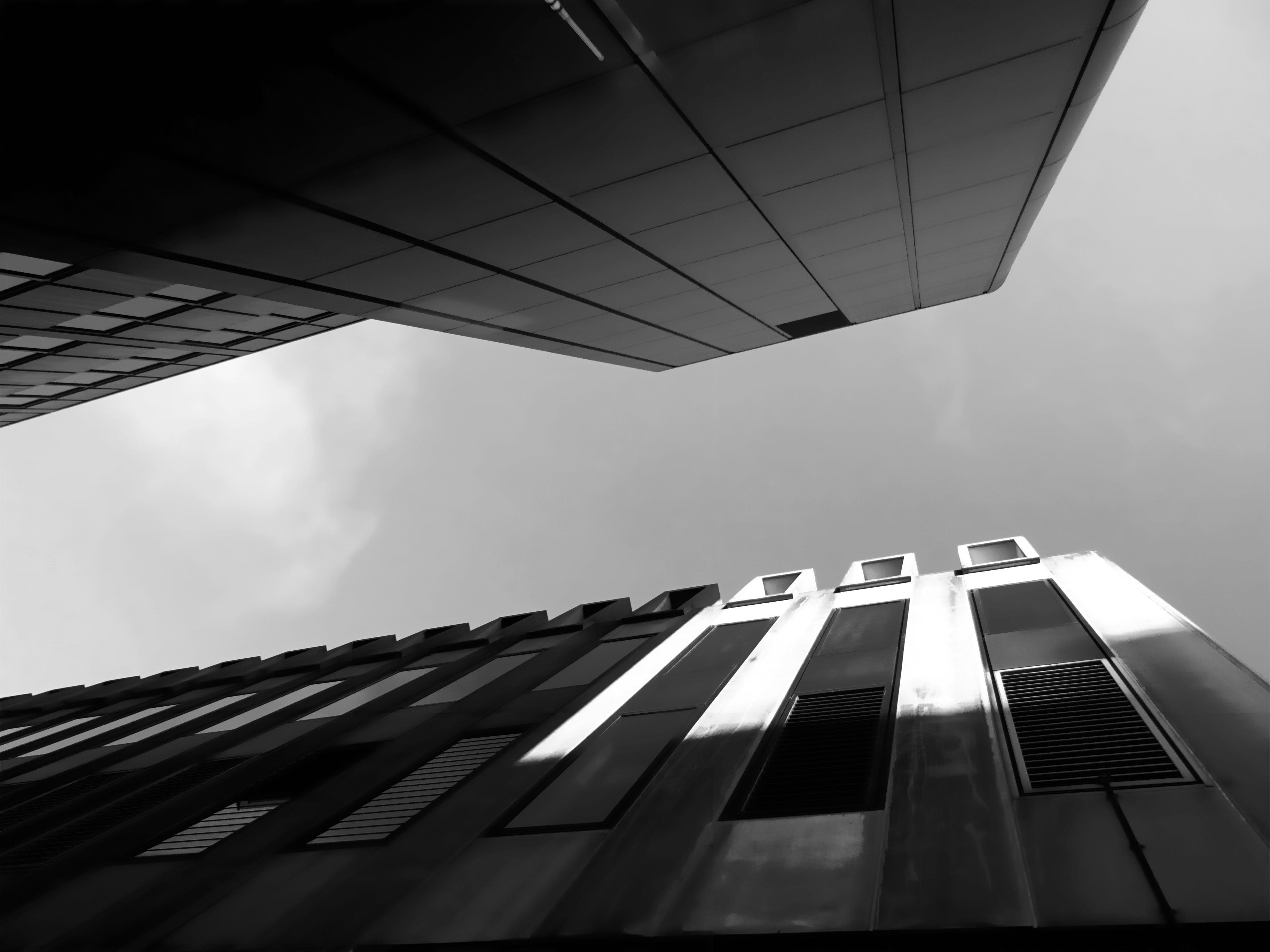 architecture, tall - high, directly below, glass panels, sky, reflection, nature, day, perspective, environment, outdoors, monochrome, 2K, city, window, HD Wallpaper