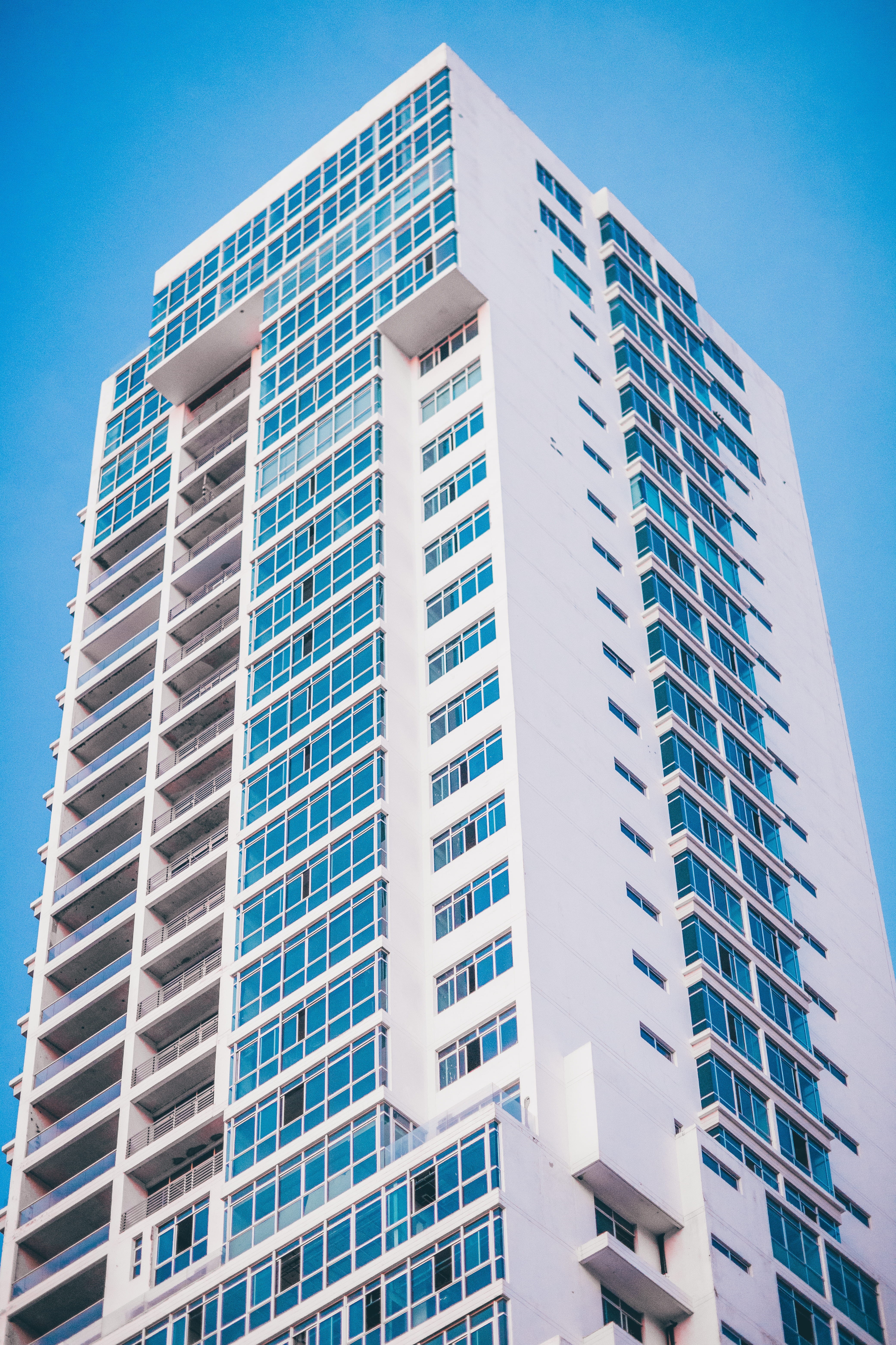 daylight, office, glass windows, perspective, rise, sunlight, facade, glass - material, building exterior, apartment building, urban, downtown, nature, Phone HD Wallpaper