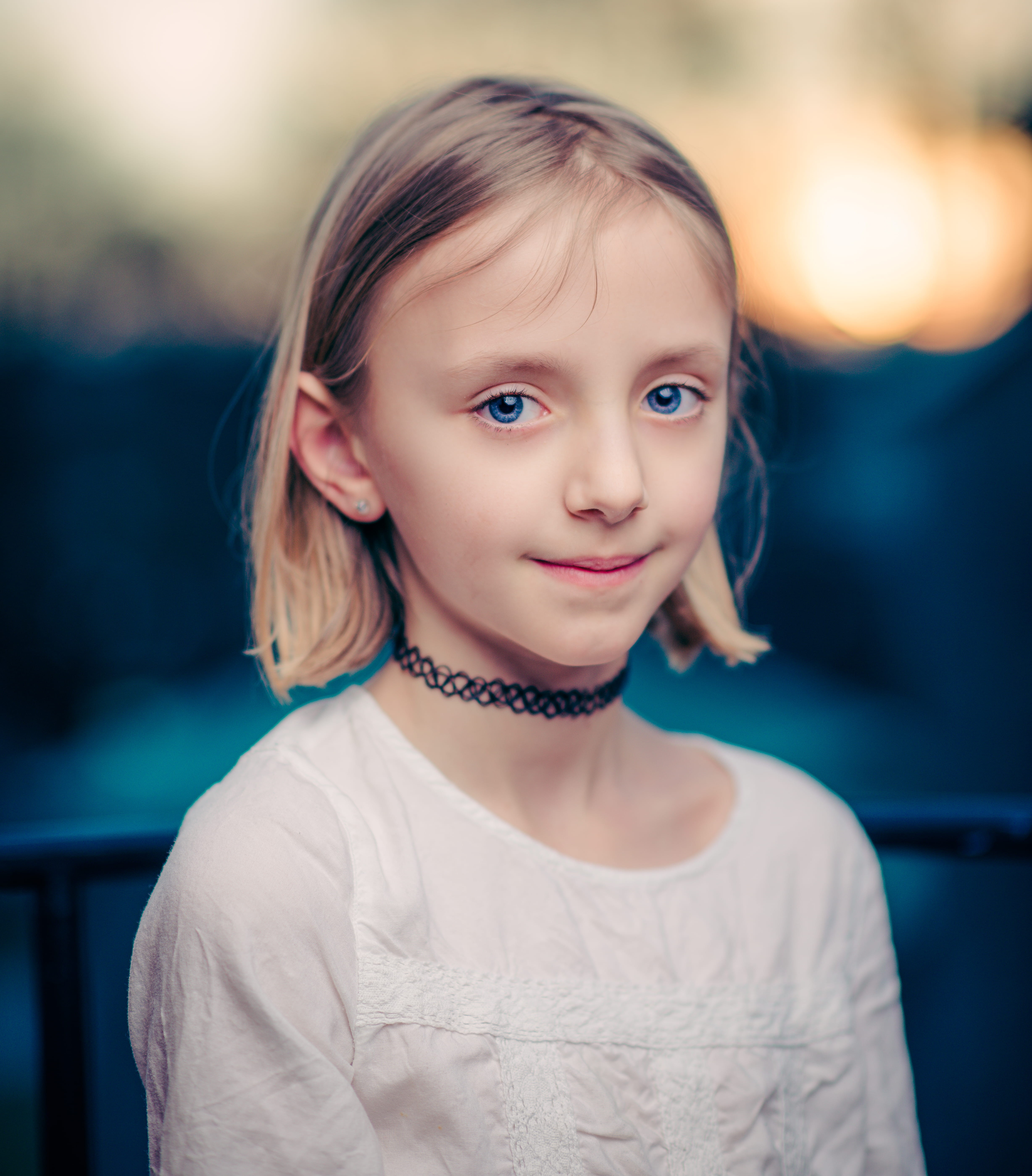 innocence, real people, girl, caucasian Ethnicity, beauty, outdoors, females, girls, necklace, front view, cute, lifestyles, smiling, selective focus, human Face, Phone HD Wallpaper