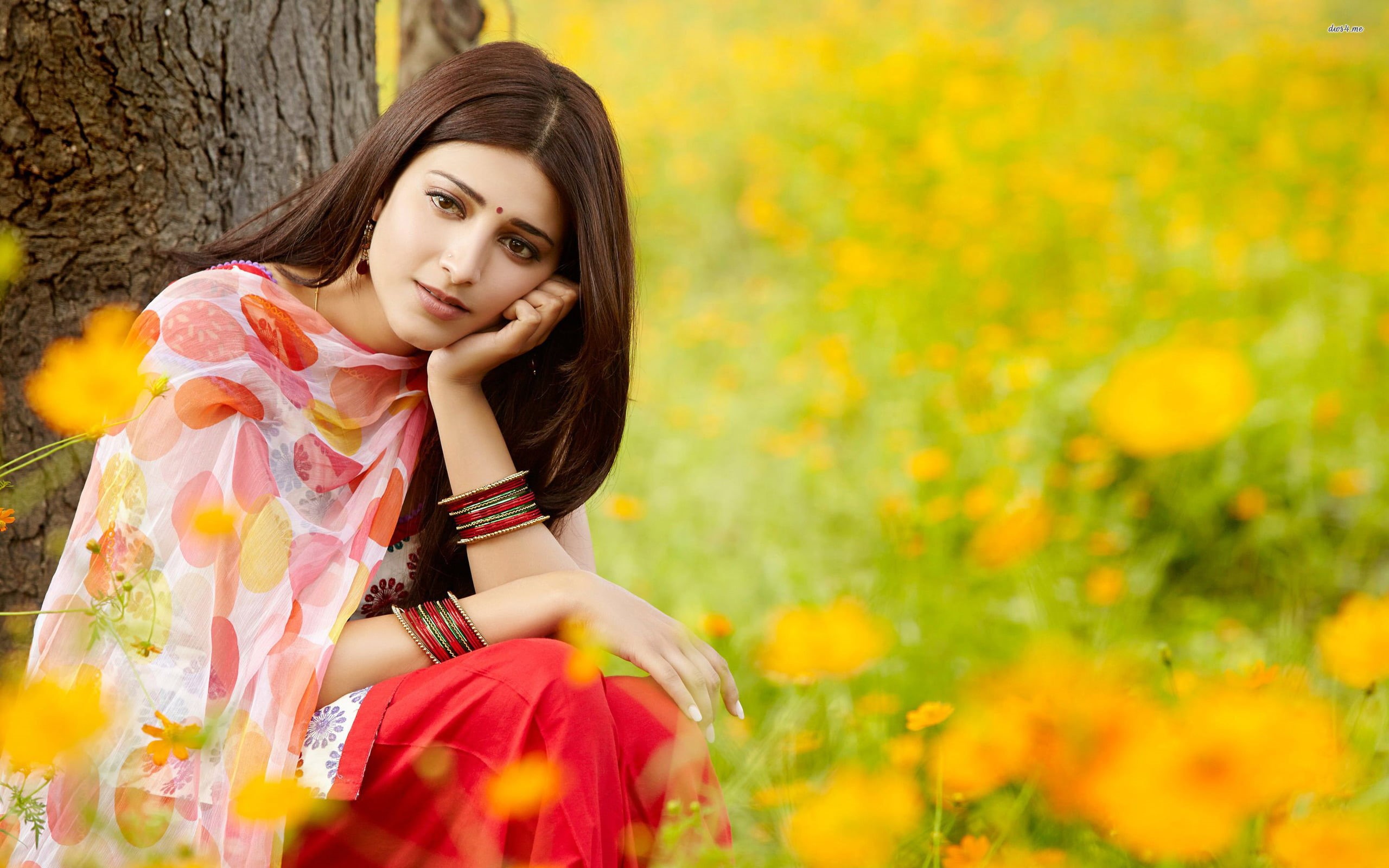 portrait, young adult, 2K, adult, young women, outdoors, shruti hassan, women, indian celebrities, flower, plant, girls, sitting, hair, lifestyles, smiling, HD Wallpaper