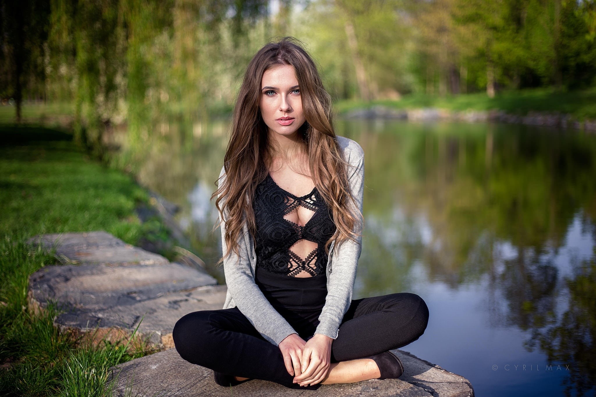 nature, sitting, hairstyle, Cyril Max, Misha, portrait, the water, pose, 1080P, model, beauty, pond, trees, greens, outfit, Park, makeup, brown hair, bokeh, HD Wallpaper