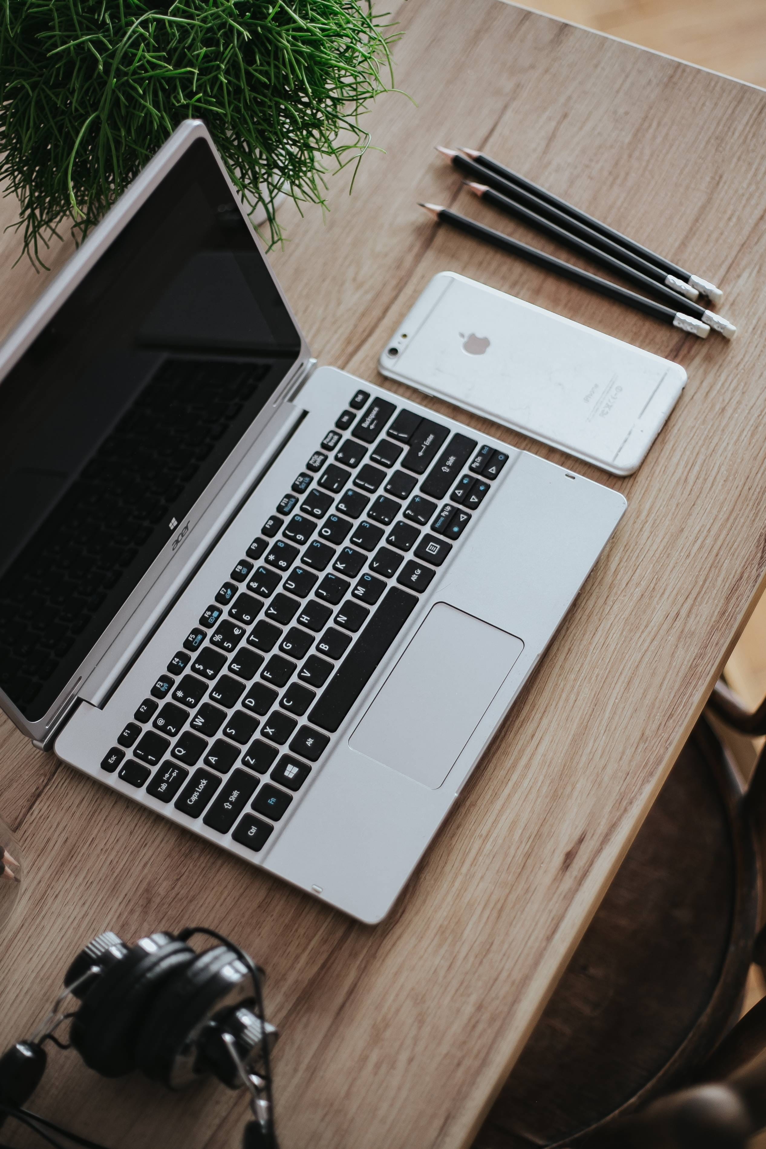 Apple iPhone, table, notebook, computer Keyboard, connection, wood - Material, green, plant, portable information device, working, computer equipment, coffee - Drink, Phone HD Wallpaper