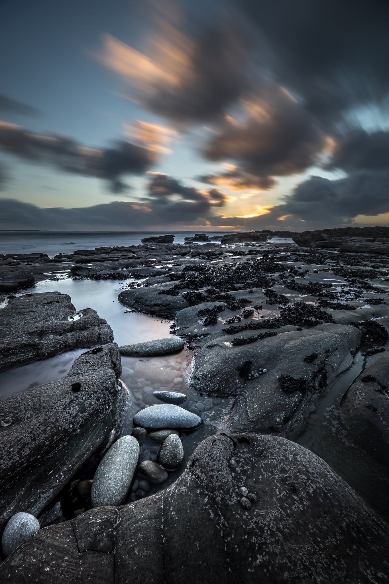 scenics, blu, stones, dusk, sea, photo, long exposure, 1080P, ultra, beach, selective focus, sony, focus, gray, rock - Object, fullframe, outdoors, selective, Phone HD Wallpaper