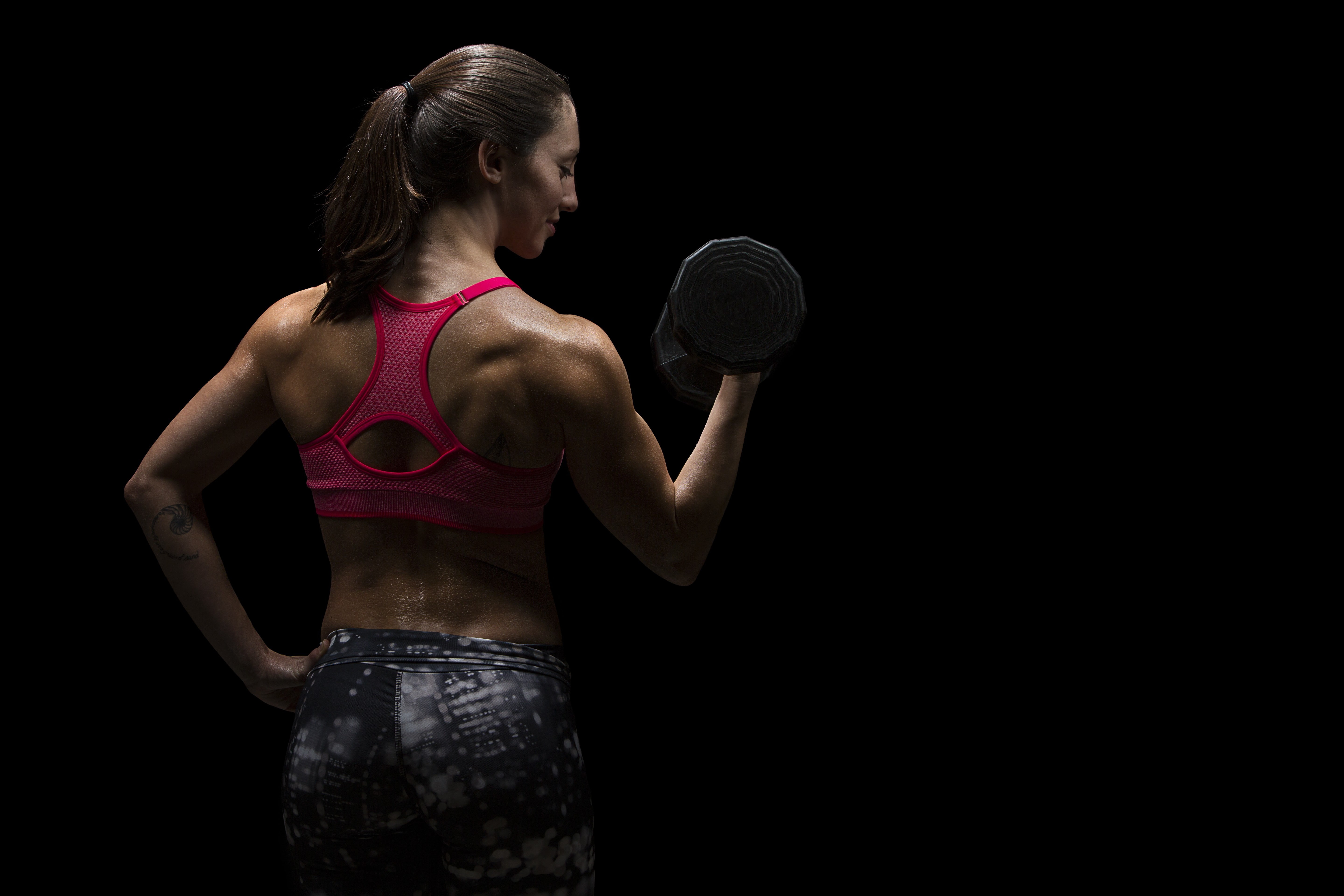 studio shot, athlete, standing, adult, copy space, rear view, holding, determination, clothing, one person, 5K, sport, hairstyle, fitness model, young adult, HD Wallpaper