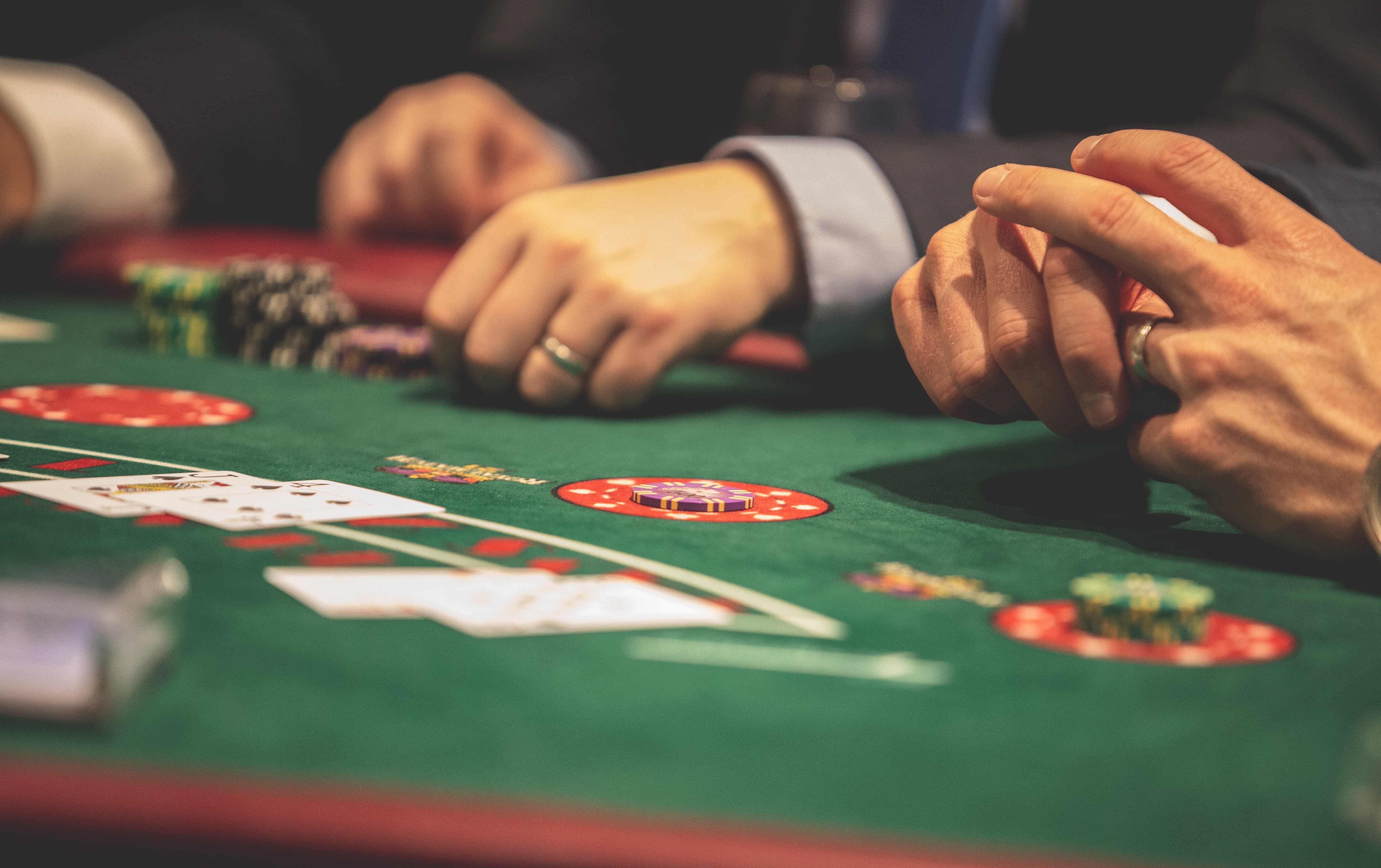 real people, risky, play, table, leisure games, deck, participate, playing, men, one person, playing cards, close-up, poker, casino, spade, selective focus, HD Wallpaper