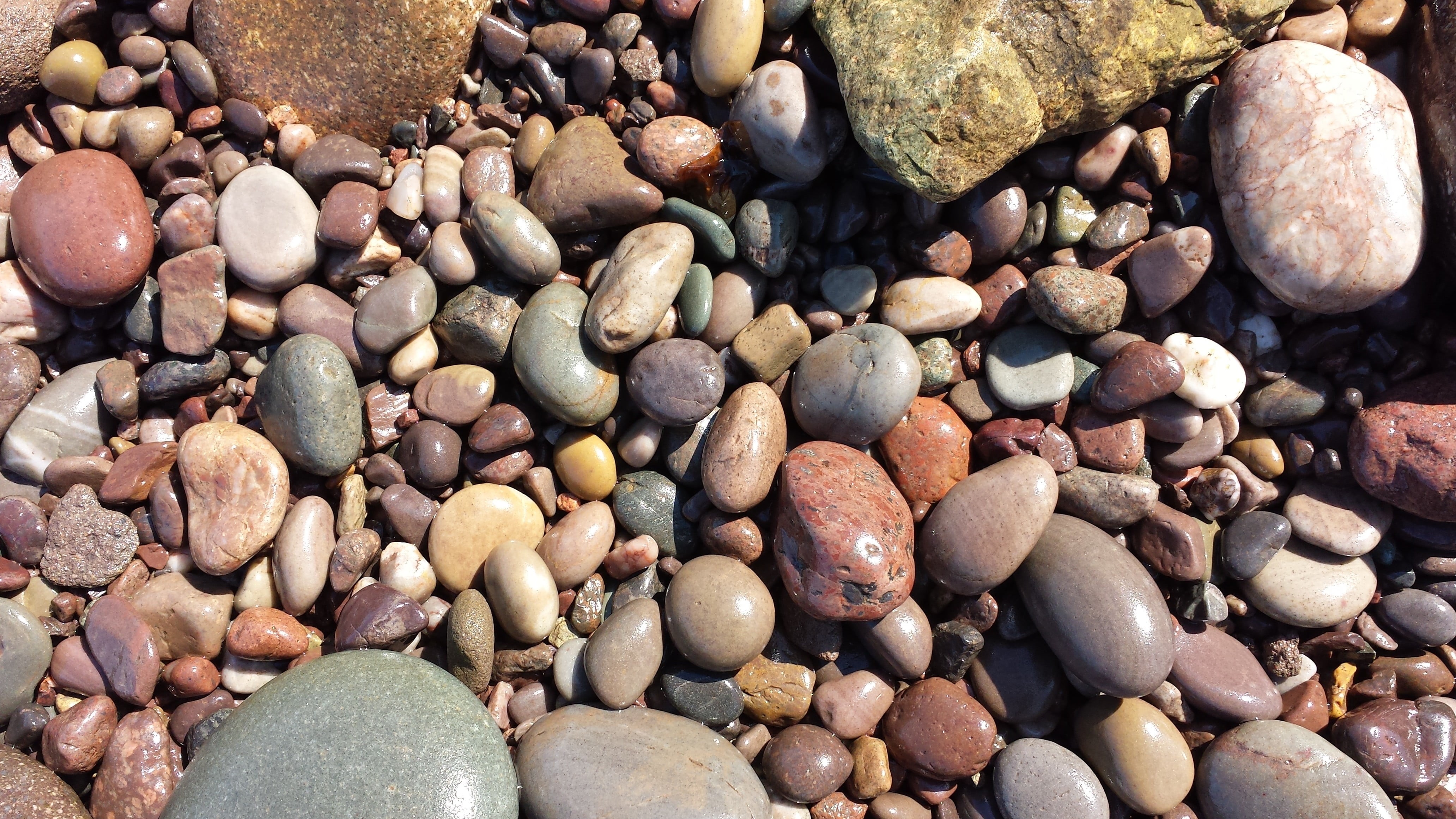 stone, land, backgrounds, beach, pebble, rock, assorted, pebbles, abundance, solid, textured, stones, rock - object, day, full frame, sunlight, high angle view, HD Wallpaper