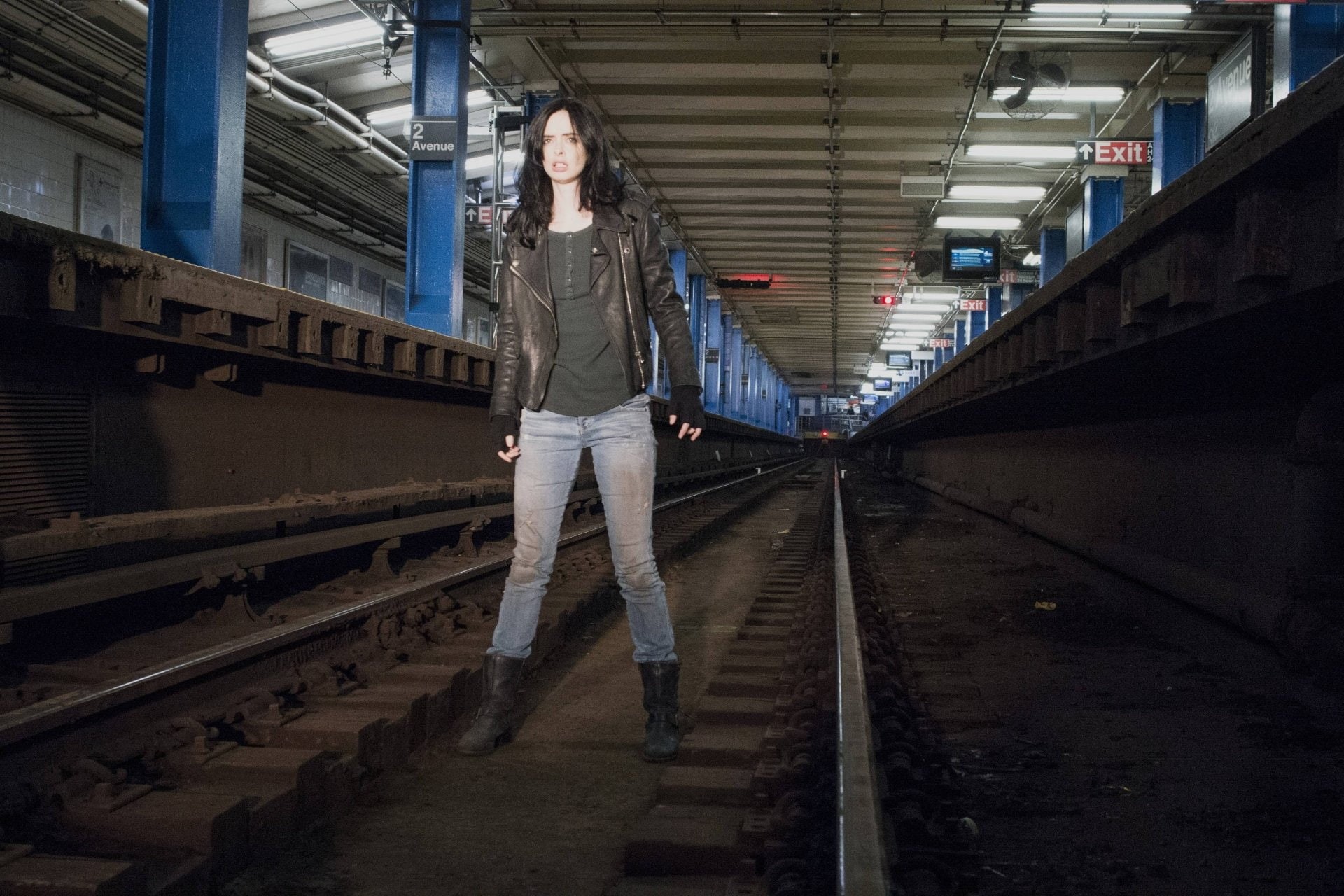 standing, Krysten Ritter, young adult, casual clothing, built structure, lifestyles, front view, staircase, Jessica Jones, adult, track, real people, railroad track, HD Wallpaper