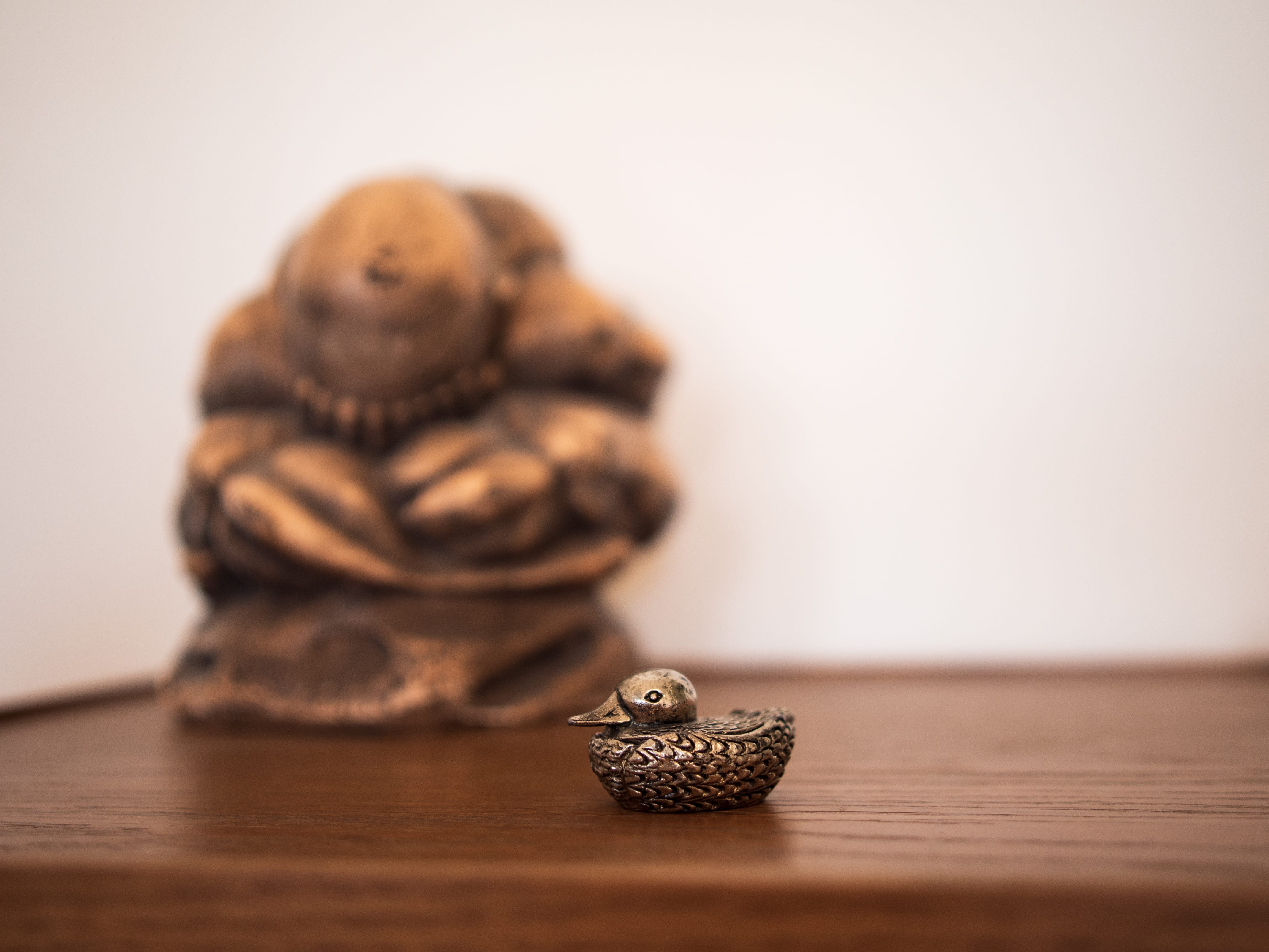 worship, ivory, toy, snail, food and drink, figurine, focus on foreground, plywood, shelf, tabletop, wood, wood - material, animal themes, one animal, mammal, HD Wallpaper
