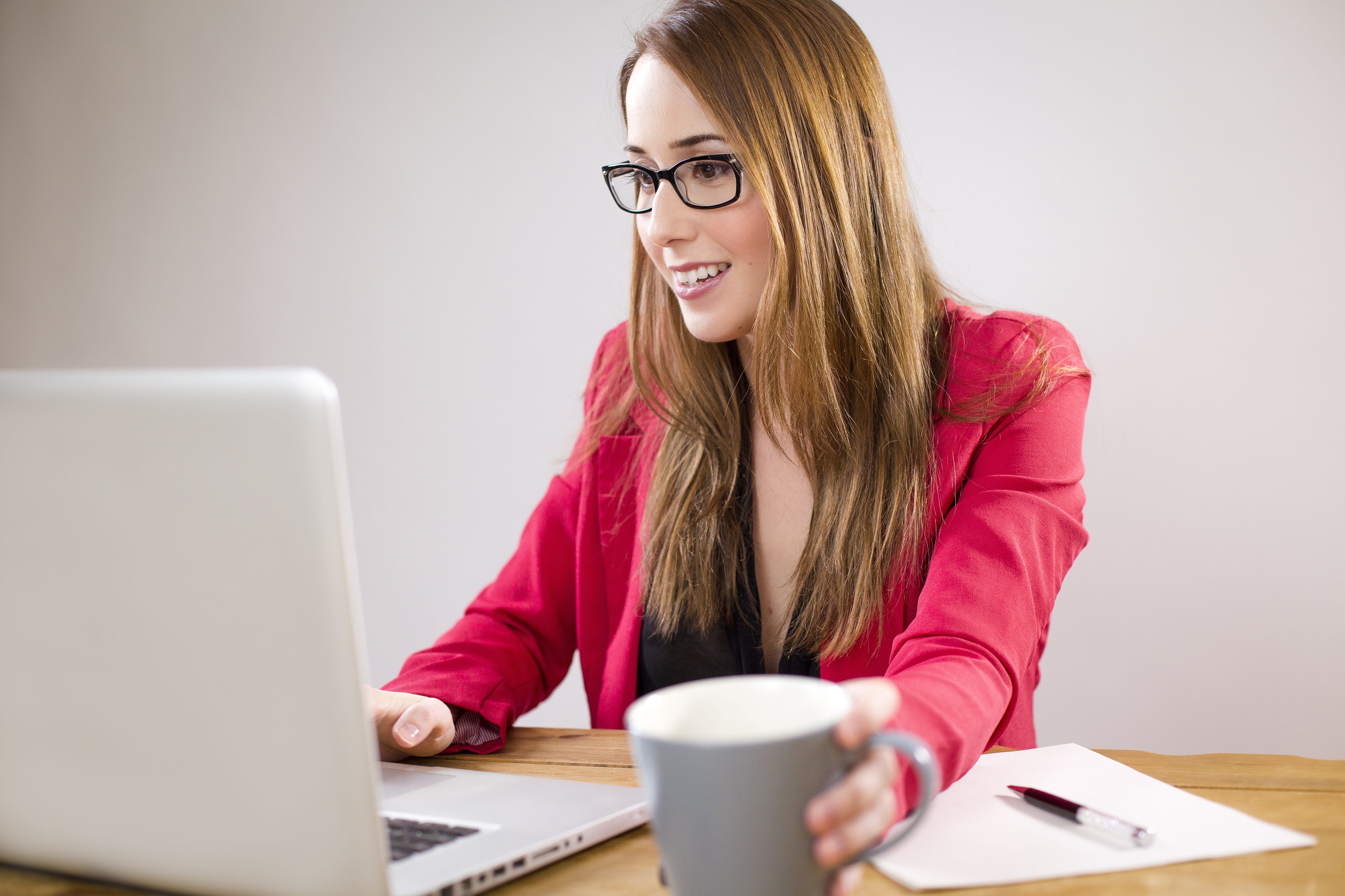 one person, office, using, communication, mug, work, young adult, technology, holding, hard working, desk, table, cup, coffee, businesswoman, smile, wireless technology, HD Wallpaper