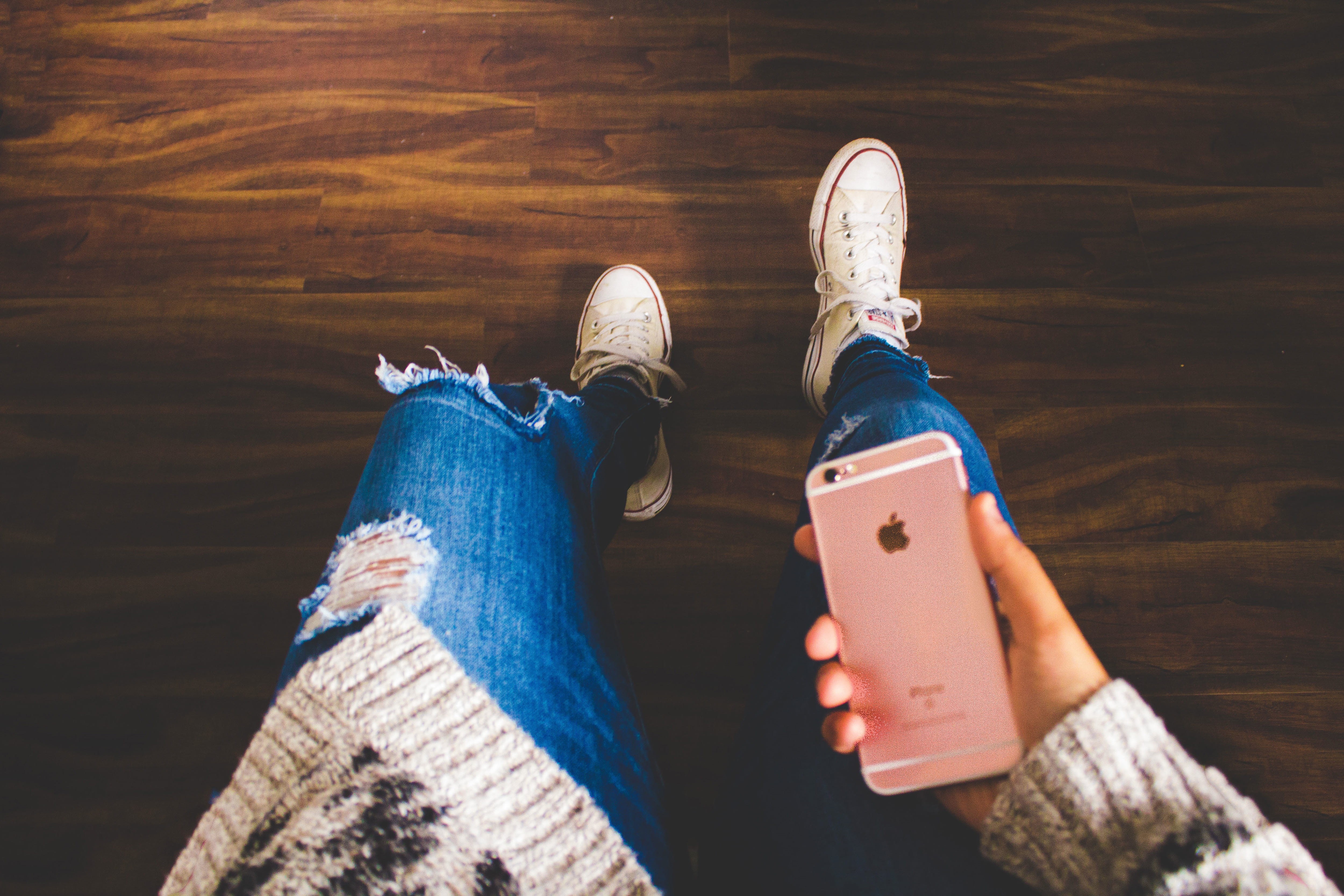 people, looking, high angle view, hand, woman, shoe, warm clothing, human body part, phone, human foot, personal perspective, jeans, hardwood floor, wearing, HD Wallpaper