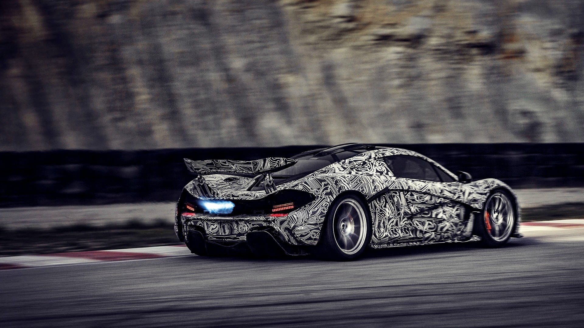 outdoors, black, close-up, single object, race tracks, coupe, Hybrid, wheel, 1080P, race cars, twin-turbo, car, motion, tire, McLaren, speed, focus on foreground, HD Wallpaper