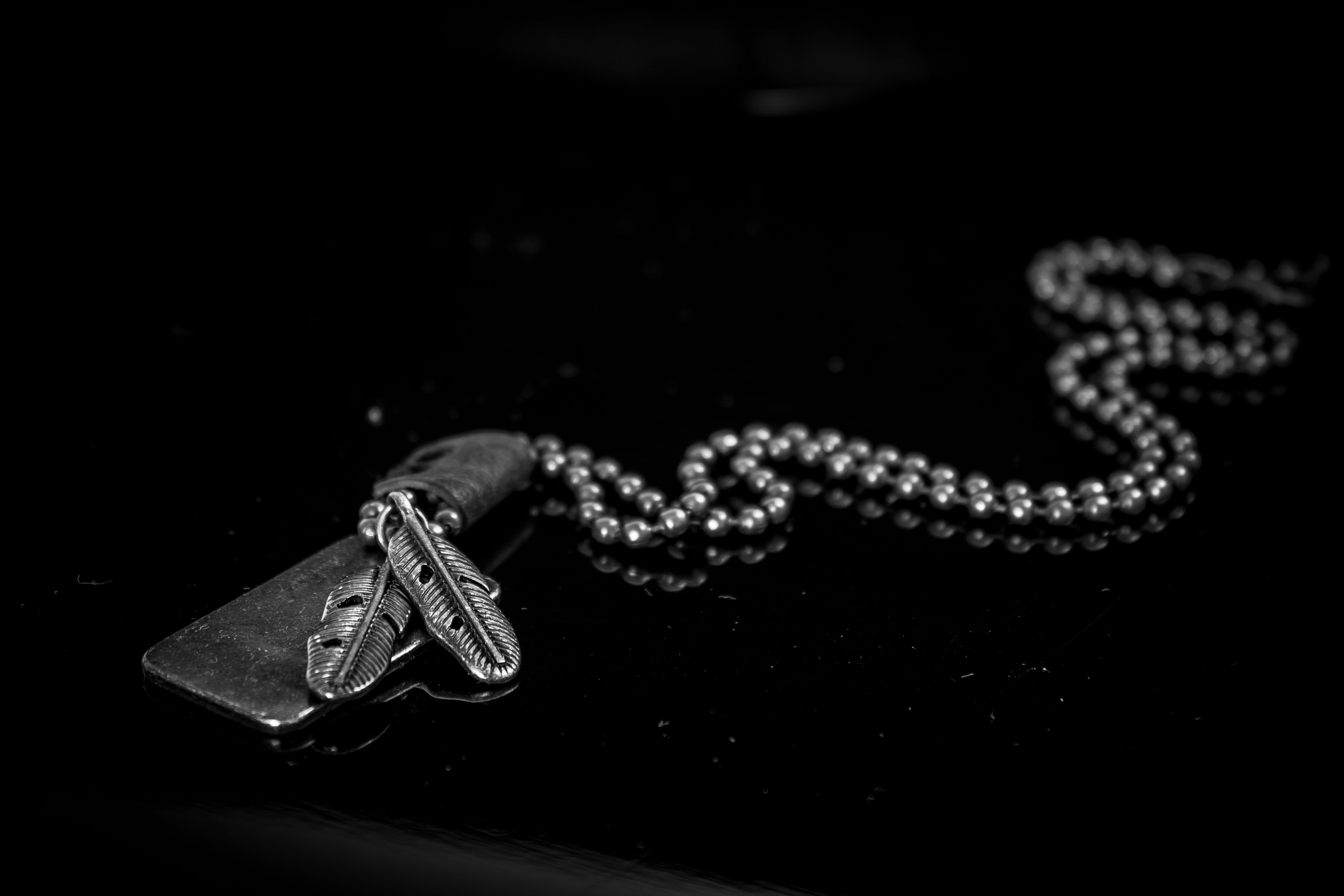 fashion, jewelry, dark, still life, necklace, 5K, black, pendant, no people, precious gem, close-up, beads, metal, personal accessory, wealth, selective focus, HD Wallpaper