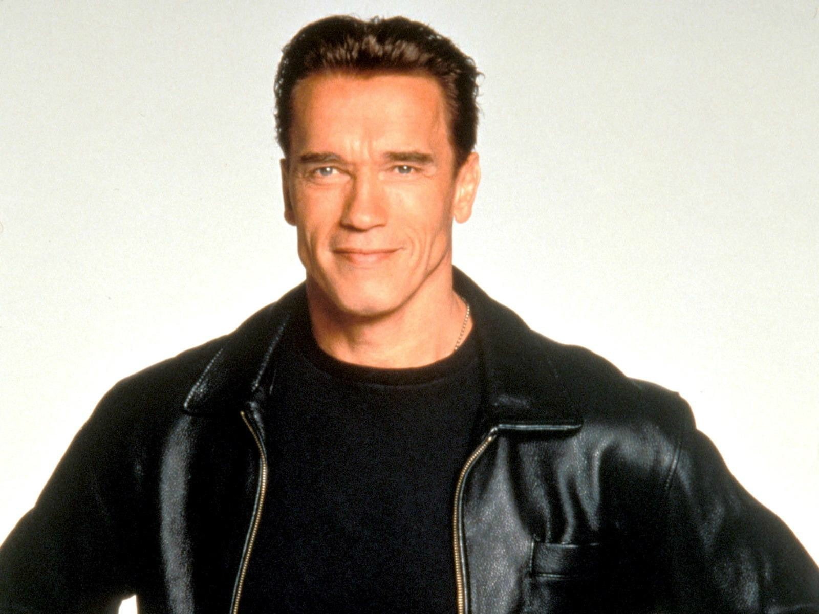 jacket, smiling, clothing, real people, 720P, Arnold Schwarzenegger, warm clothing, indoors, casual clothing, males, one person, portrait, leather, black color, HD Wallpaper