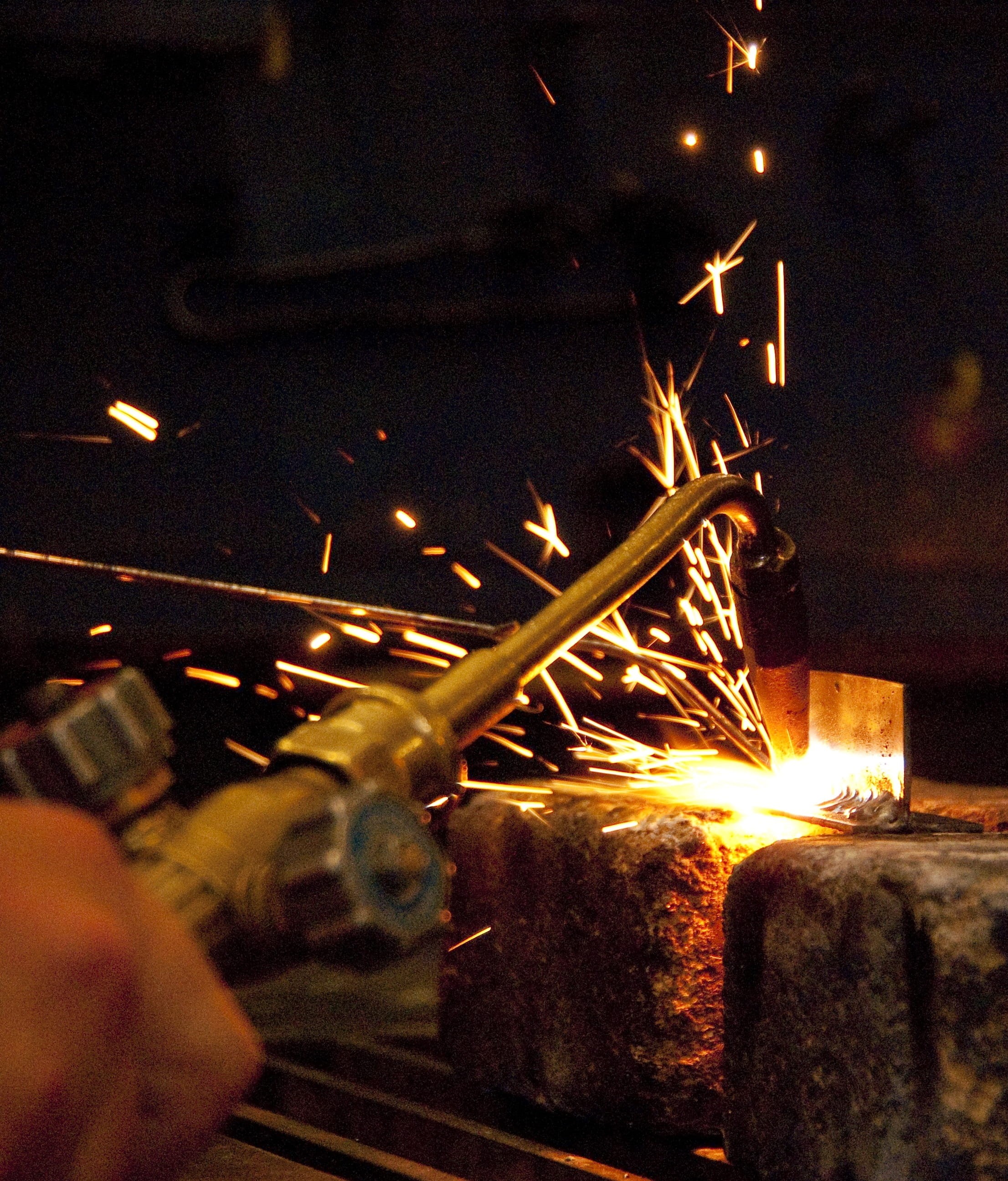 heat - Temperature, finger, foundry, sparks, real people, night, workshop, metal, people, welding, burning, cutting, human hand, metal industry, 2K, hand, Phone HD Wallpaper