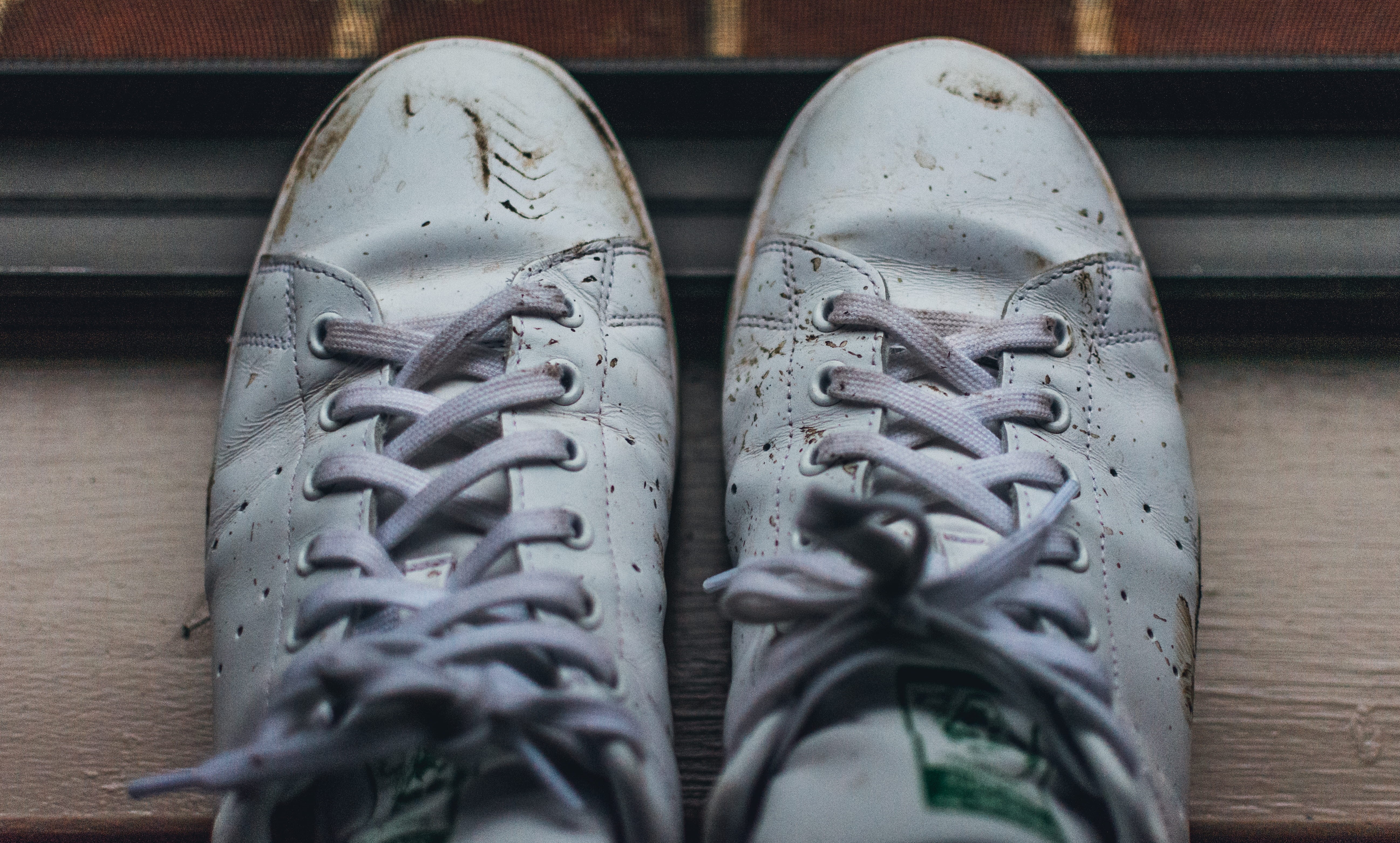 flooring, table, 5K, focus on foreground, shoes, high angle view, brown, shoelace, sneakers, pair, dirty, indoors, close-up, adidas, day, text, still life, HD Wallpaper