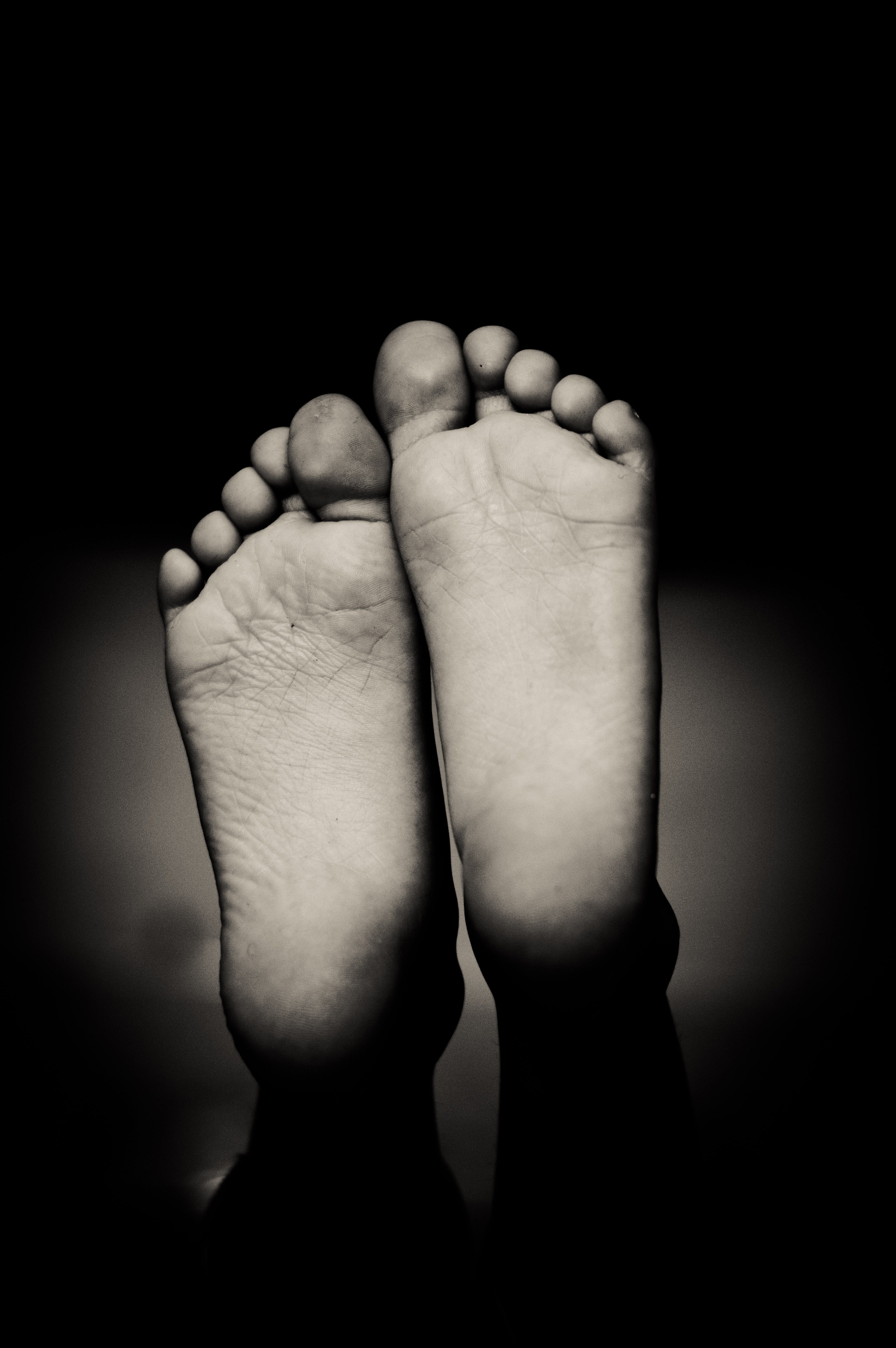 black background, studio shot, real people, feet, babyhood, human foot, human body part, human, finger, ankle, hand, photo, foots, human limb, soles of feet, Phone HD Wallpaper