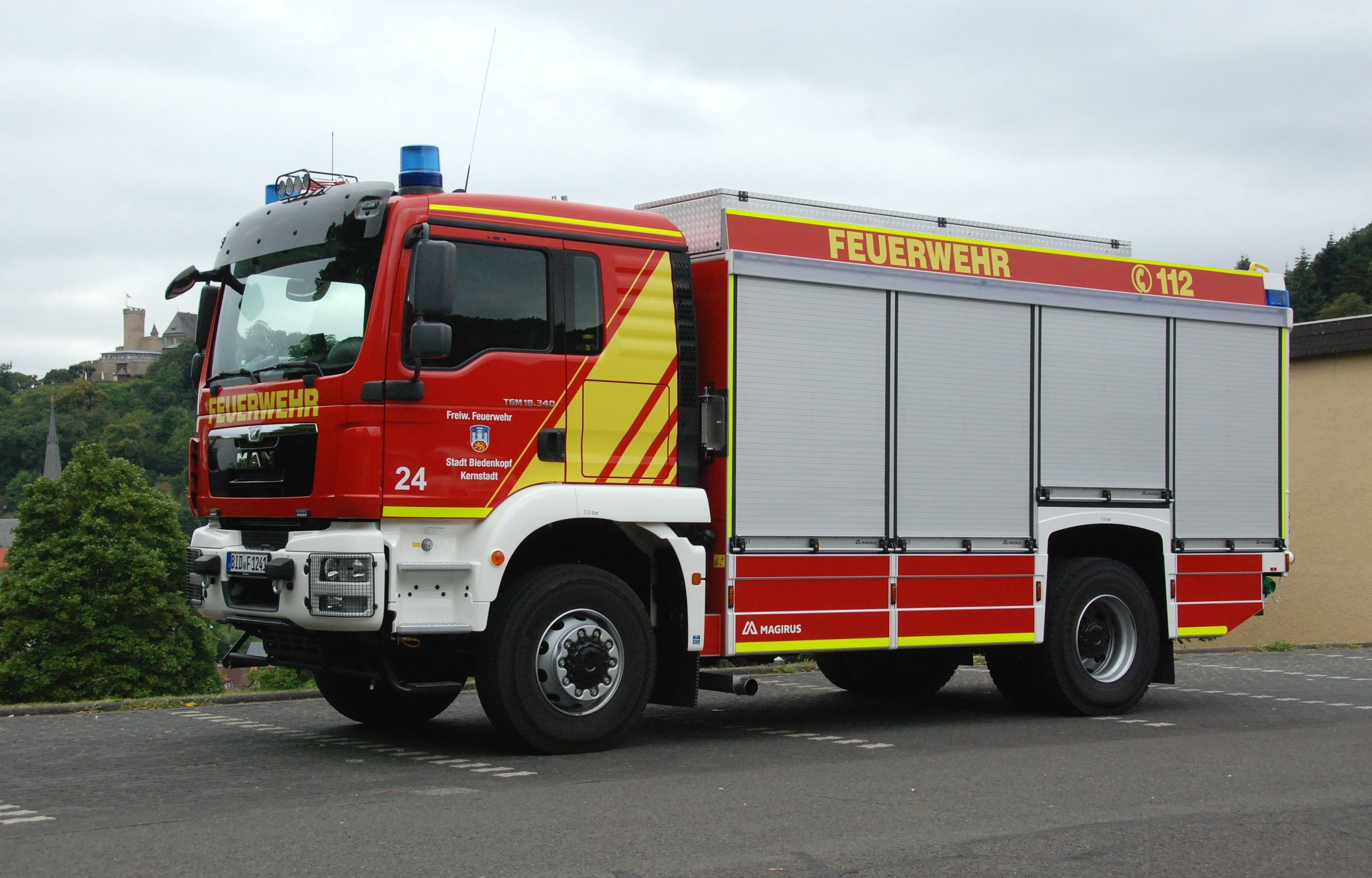 feuerwehr, text, occupation, emergency, engine, vehicle, city, day, red, truck, transportation, fire, road, outdoors, semi, healthcare and medicine, mode of transportation, HD Wallpaper