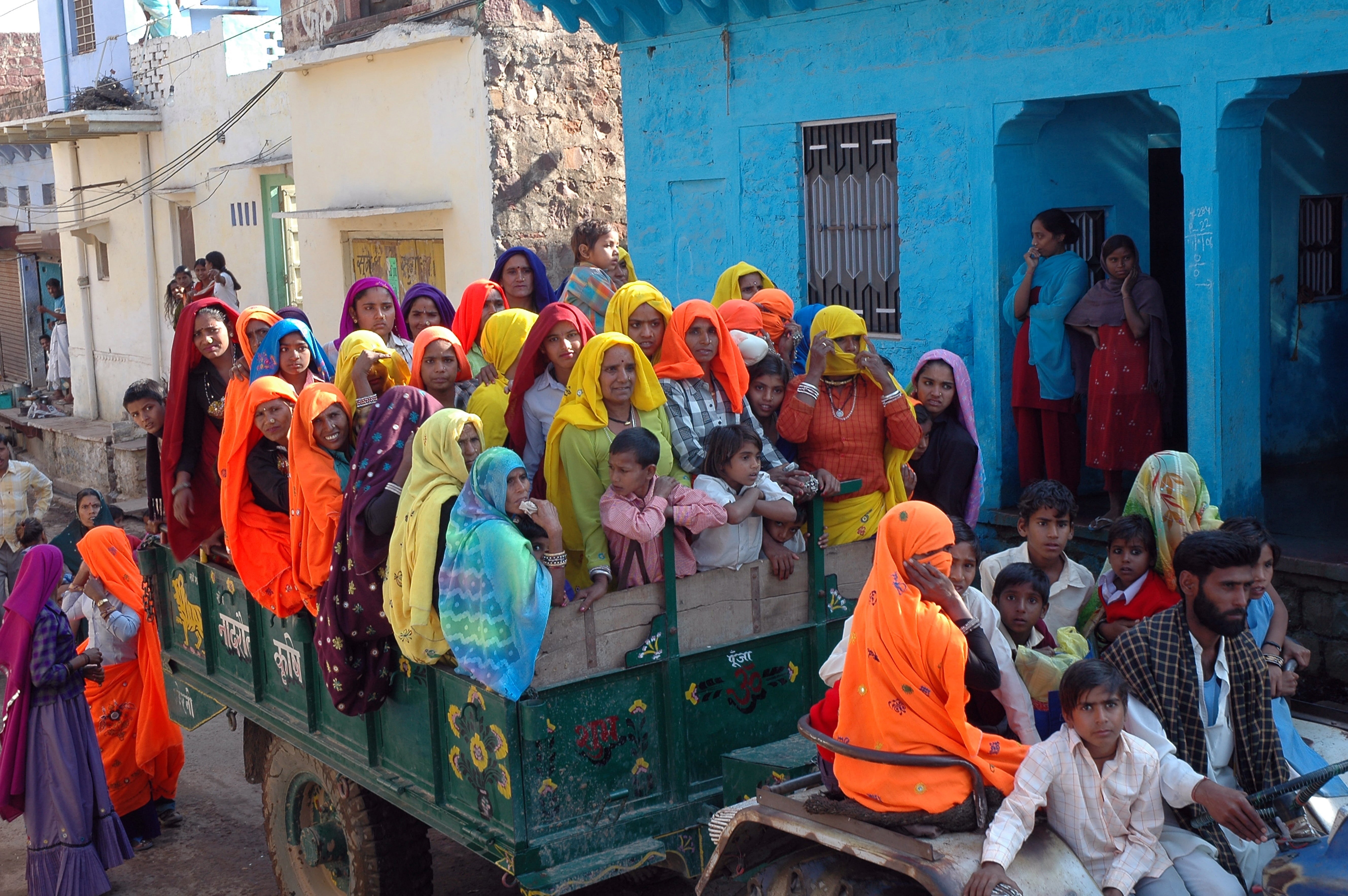 passing, trailer, building, men, child, civilization, crowd, multi colored, asia, religion, green, fool, day, belief, spirituality, truck, women, traditional clothing, HD Wallpaper