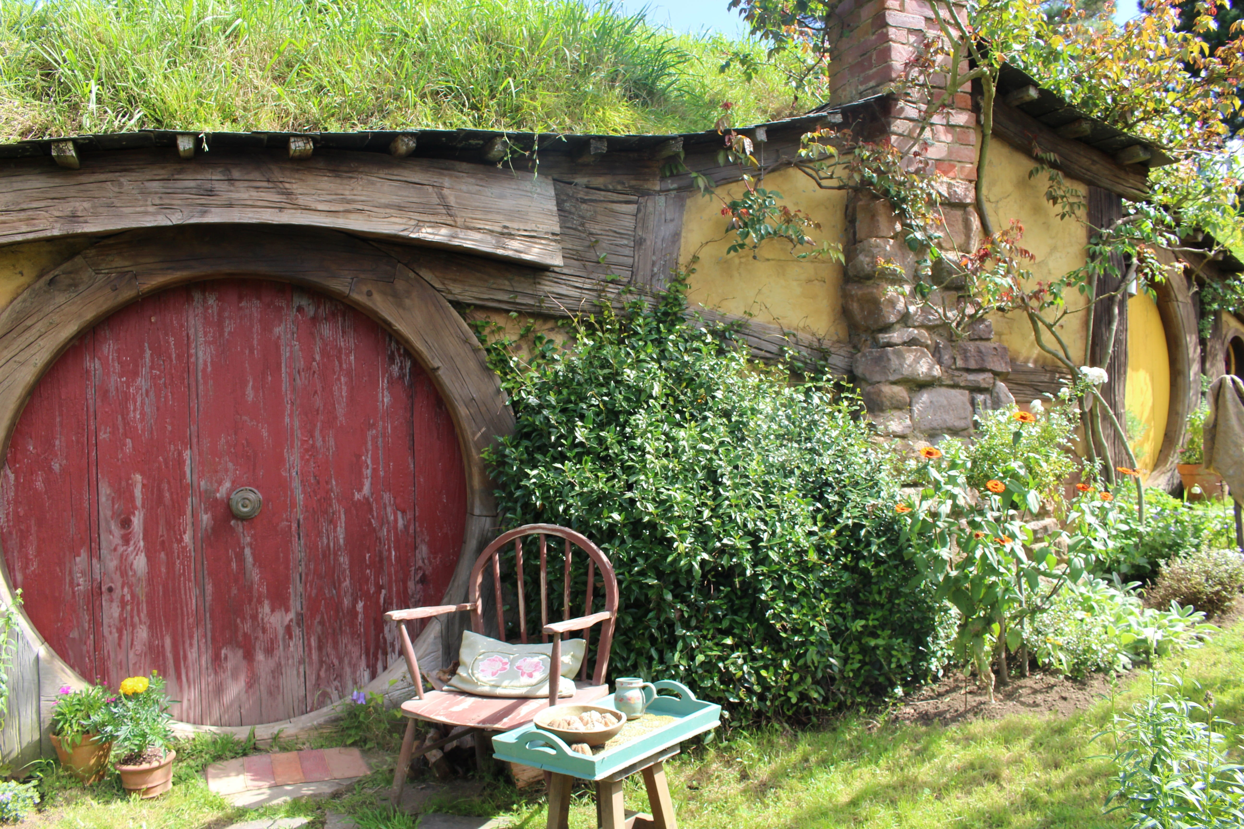 house, daytime, sunny, magic, rotorua, tourist, out, technology, fan, outdoors, building exterior, green color, lord of the rings, tree, chair, no people, HD Wallpaper