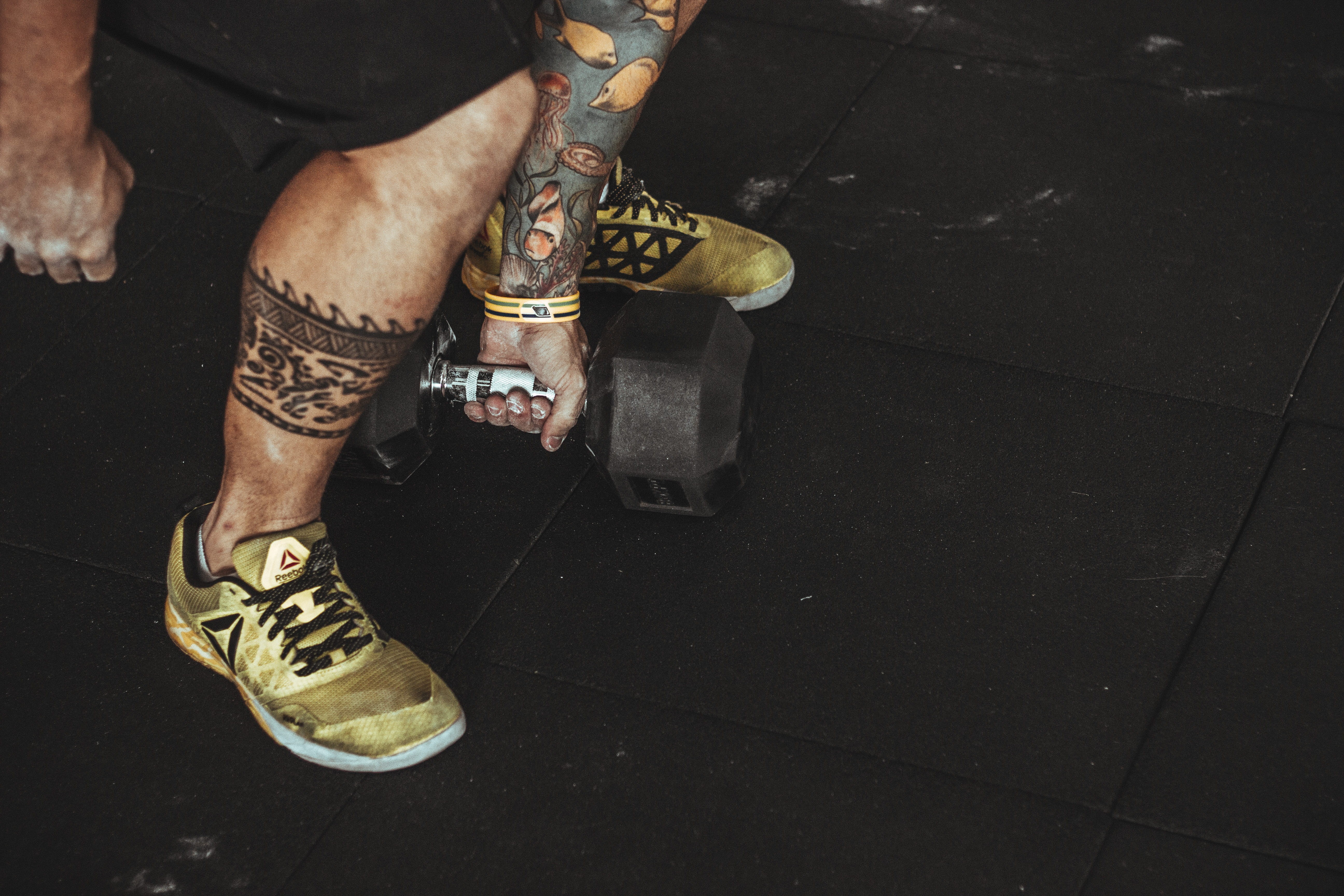 lifestyles, human body part, fitness, workout, body adornment, adult, shoe, logo, brown, shoes, tattoo, limb, indoors, crossfit, open, human limb, person, HD Wallpaper