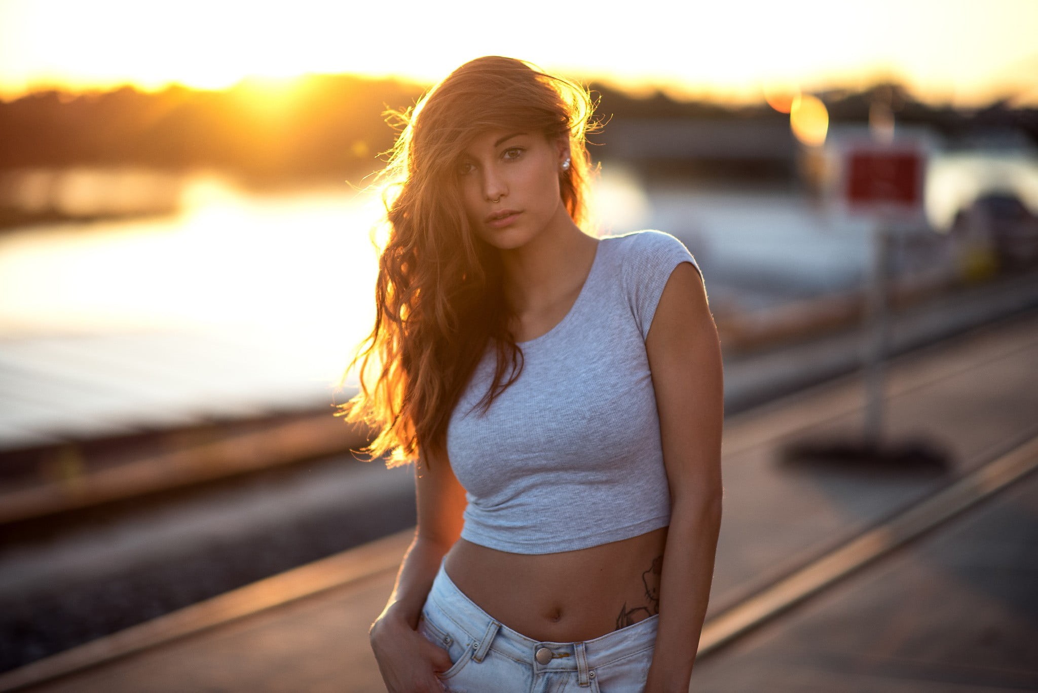 standing, waist up, nose rings, long hair, beautiful woman, one person, outdoors, casual clothing, hairstyle, belly, tattoo, beauty, depth of field, looking away, HD Wallpaper
