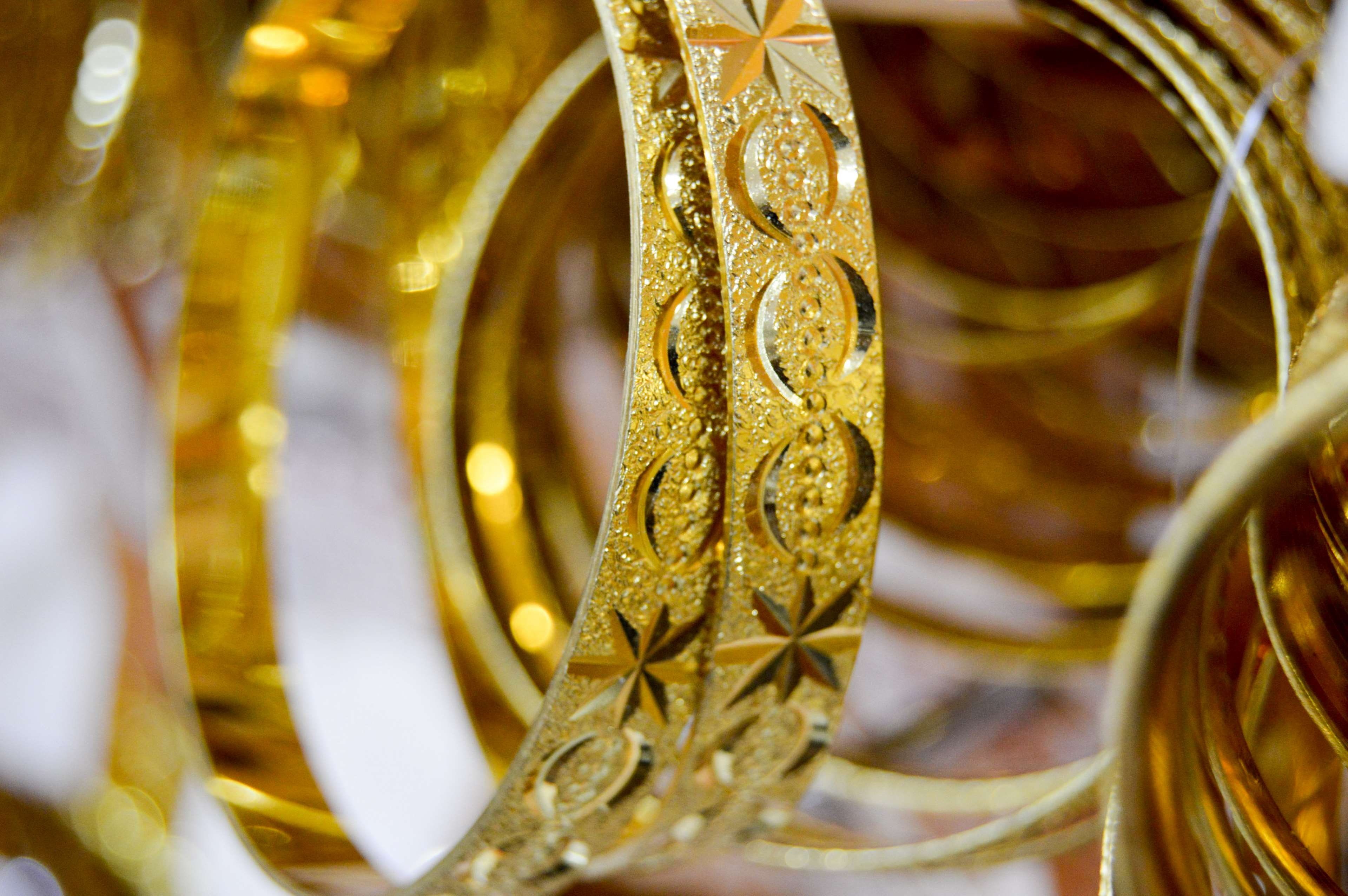 golden jewelry, selective focus, golden bangels, close-up, retail display, business, design, no people, jewelry, gold colored, shiny, bangels, indoors, HD Wallpaper