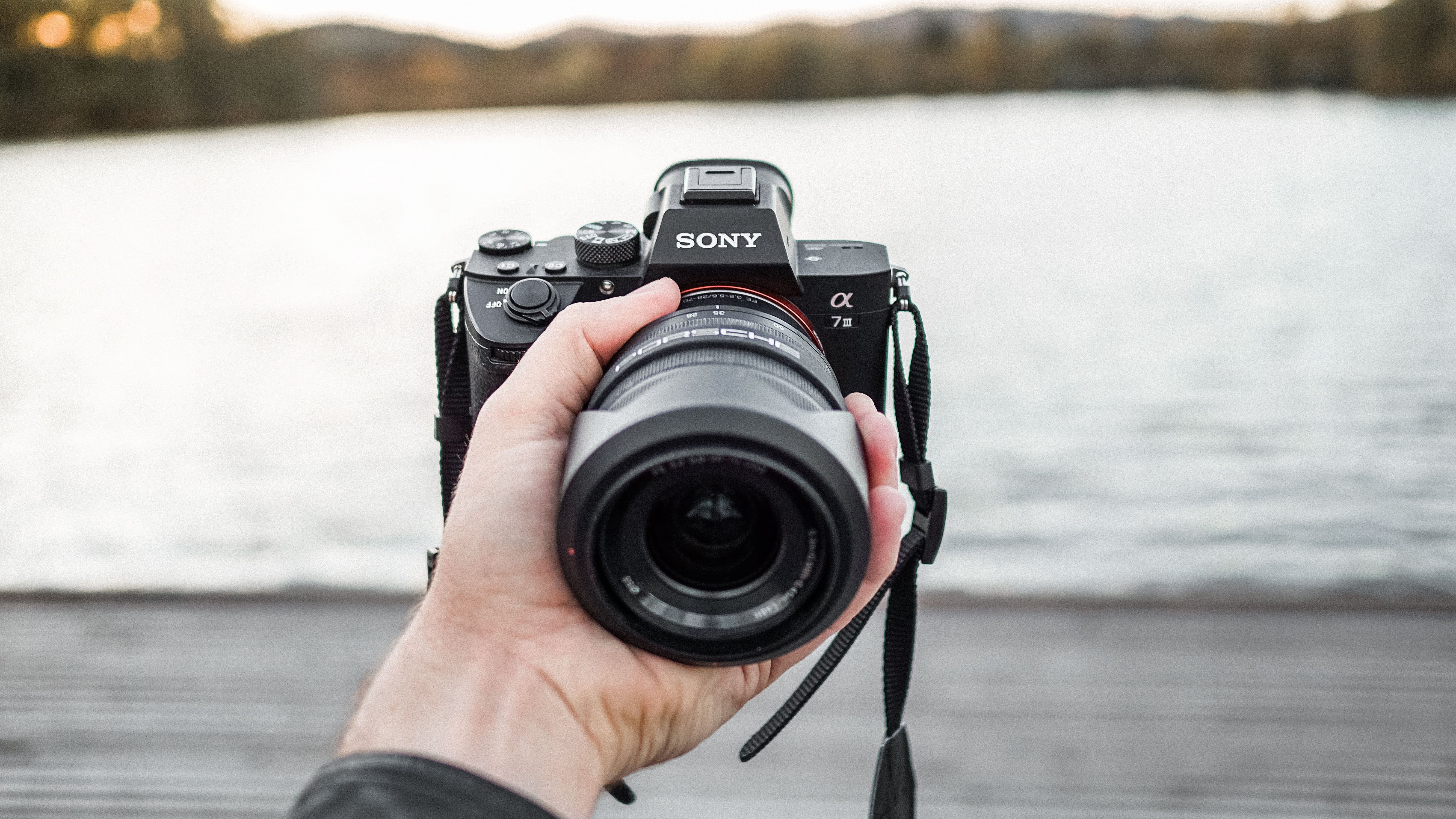 focus, photographic equipment, one person, camera gear, horizon, human body part, holding, technology, occupation, a7iii, camera, lens - optical instrument, HD Wallpaper