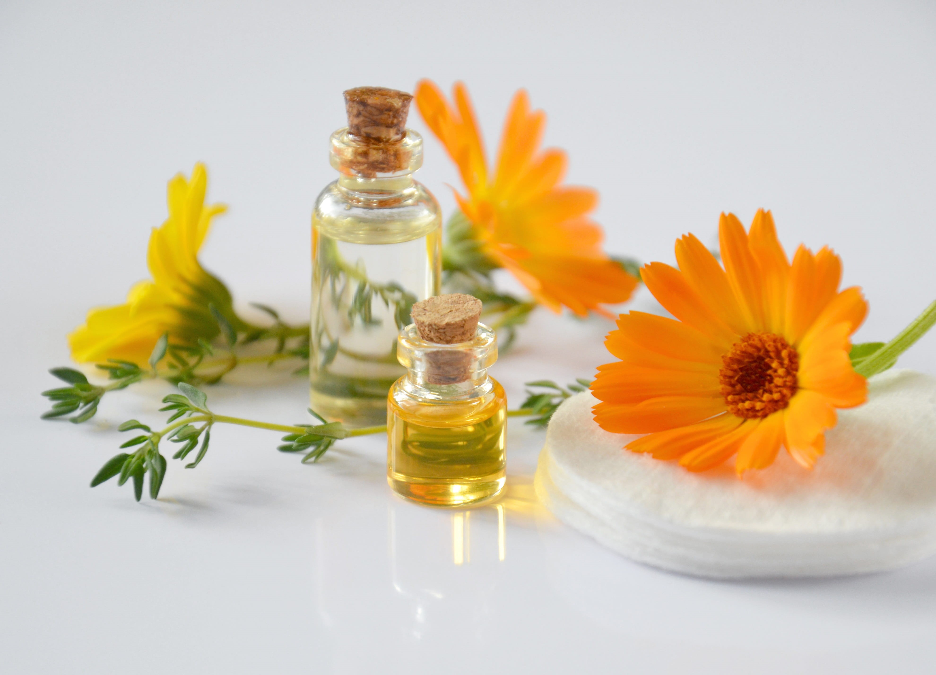 flowering plant, close-up, nature, body care, indoors, cosmetology, bottle, no people, orange flowers, oil cosmetic, essential oils, chemistry, herbal cosmetics, HD Wallpaper