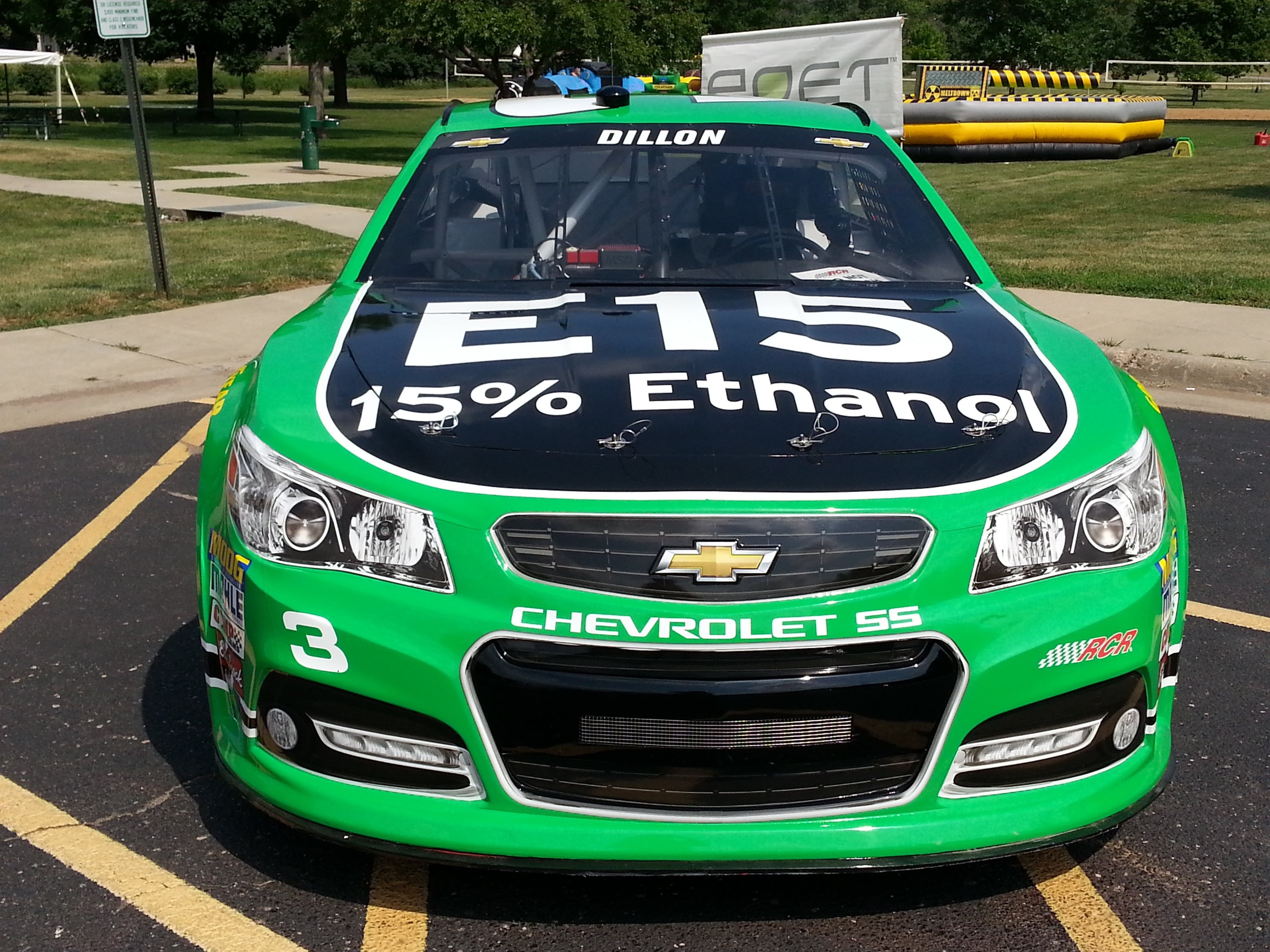 outdoors, western script, race car, city, day, sign, mode of transportation, transportation, turquoise colored, communication, racer, chevrolet ss, stock car, HD Wallpaper