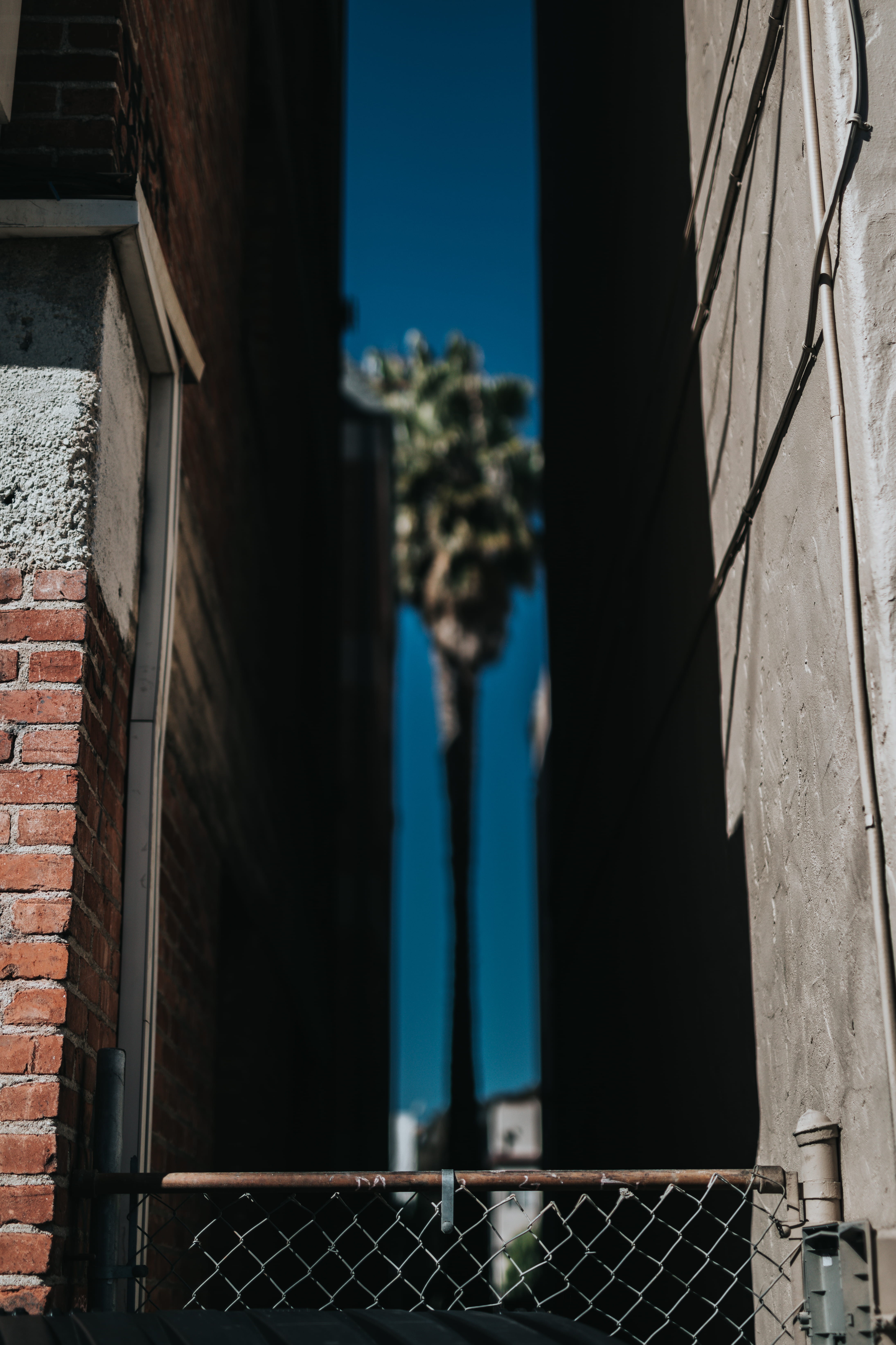 day, city, door, timberland, gritty, wall, security, metal, sunlight, cyclone, railing, house, grey, buildings, safety, chain, no people, building exterior, Phone HD Wallpaper