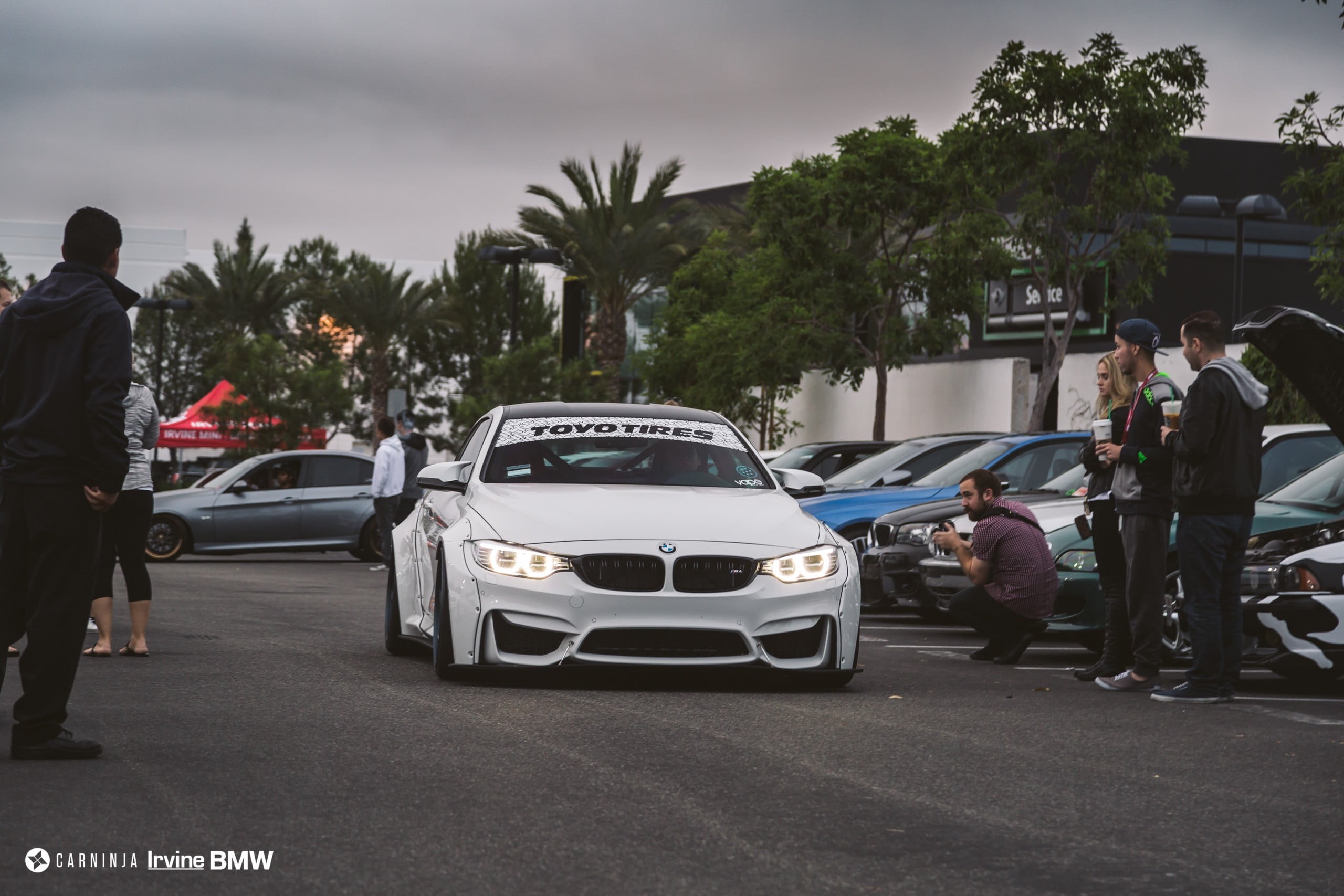 men, low, incidental people, plant, car, real people, group, people, BMW M4 Coupe, mode of transportation, architecture, city, road, sky, 2K, land vehicle, HD Wallpaper