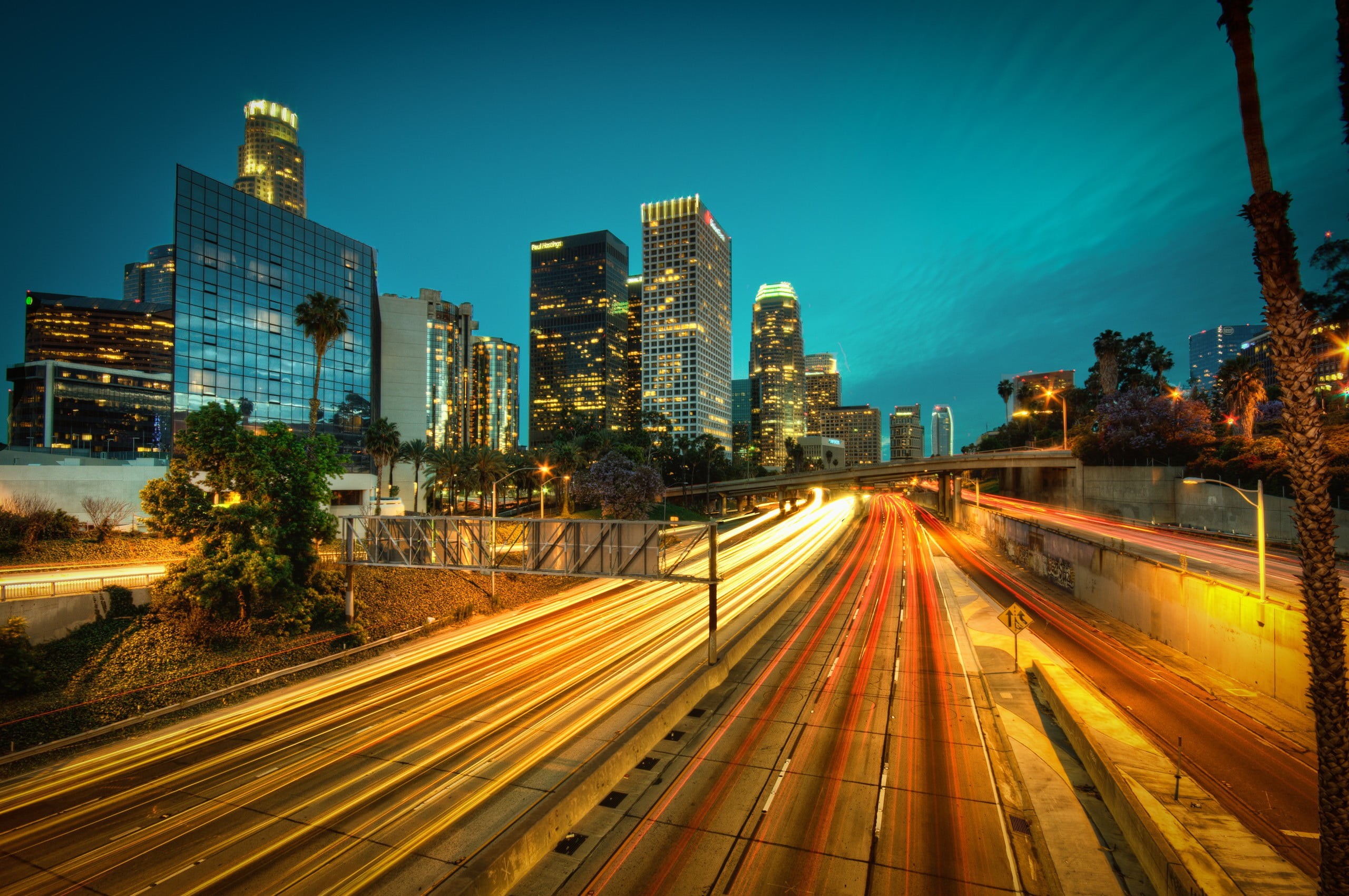 street, skyscraper, long exposure, office building exterior, photograph, sky, palm trees, traffic, light trail, motion, speed, no people, California, multiple lane highway, HD Wallpaper