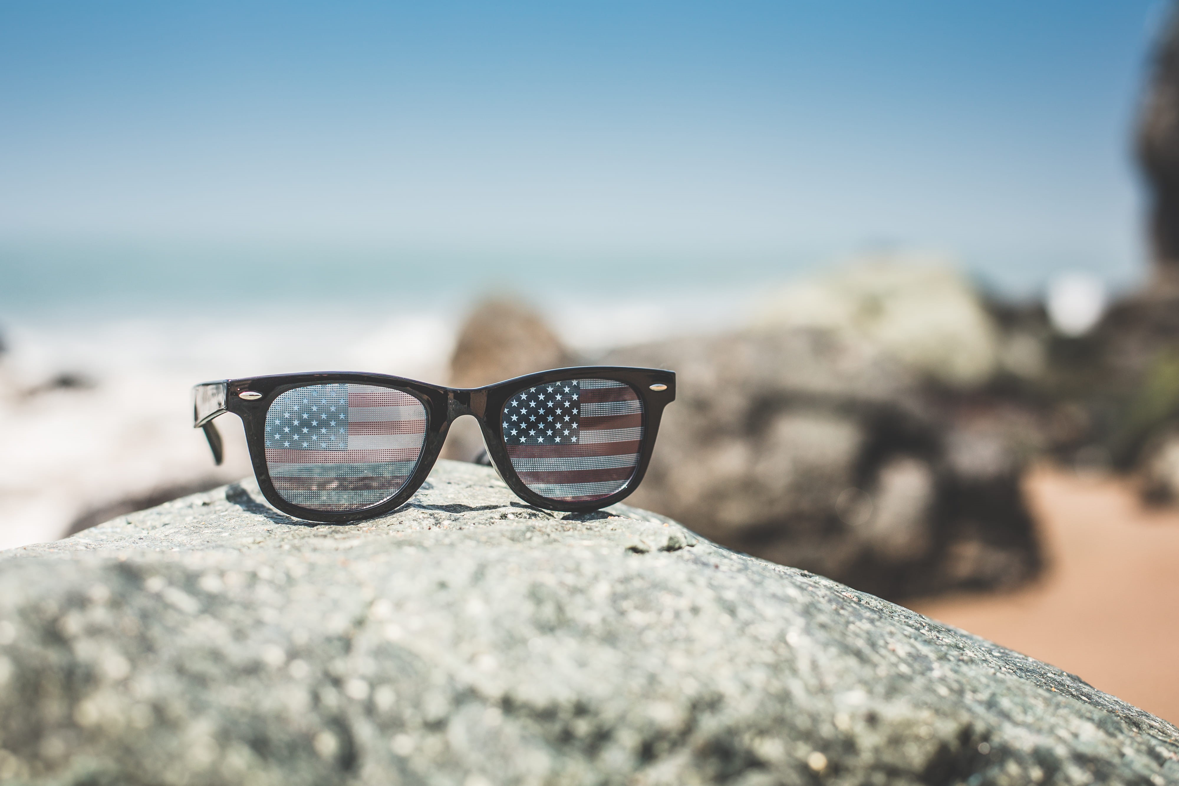 4K, outdoors, sunlight, eyeglasses, funny, land, rock, summer, clear sky, day, california, USA, Flag, fun, sea, united states, America, focus on foreground, HD Wallpaper