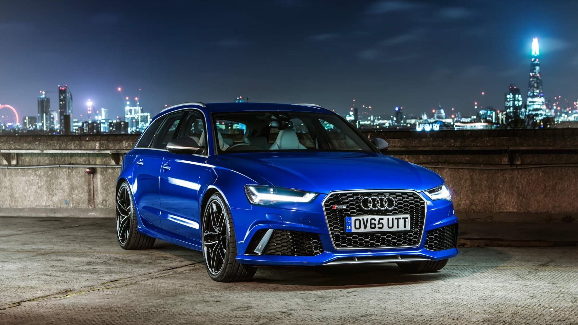 motor vehicle, city, illuminated, architecture, avant, building exterior, cityscape, retro styled, land vehicle, night, audi rs6, vintage car, built structure, HD Wallpaper