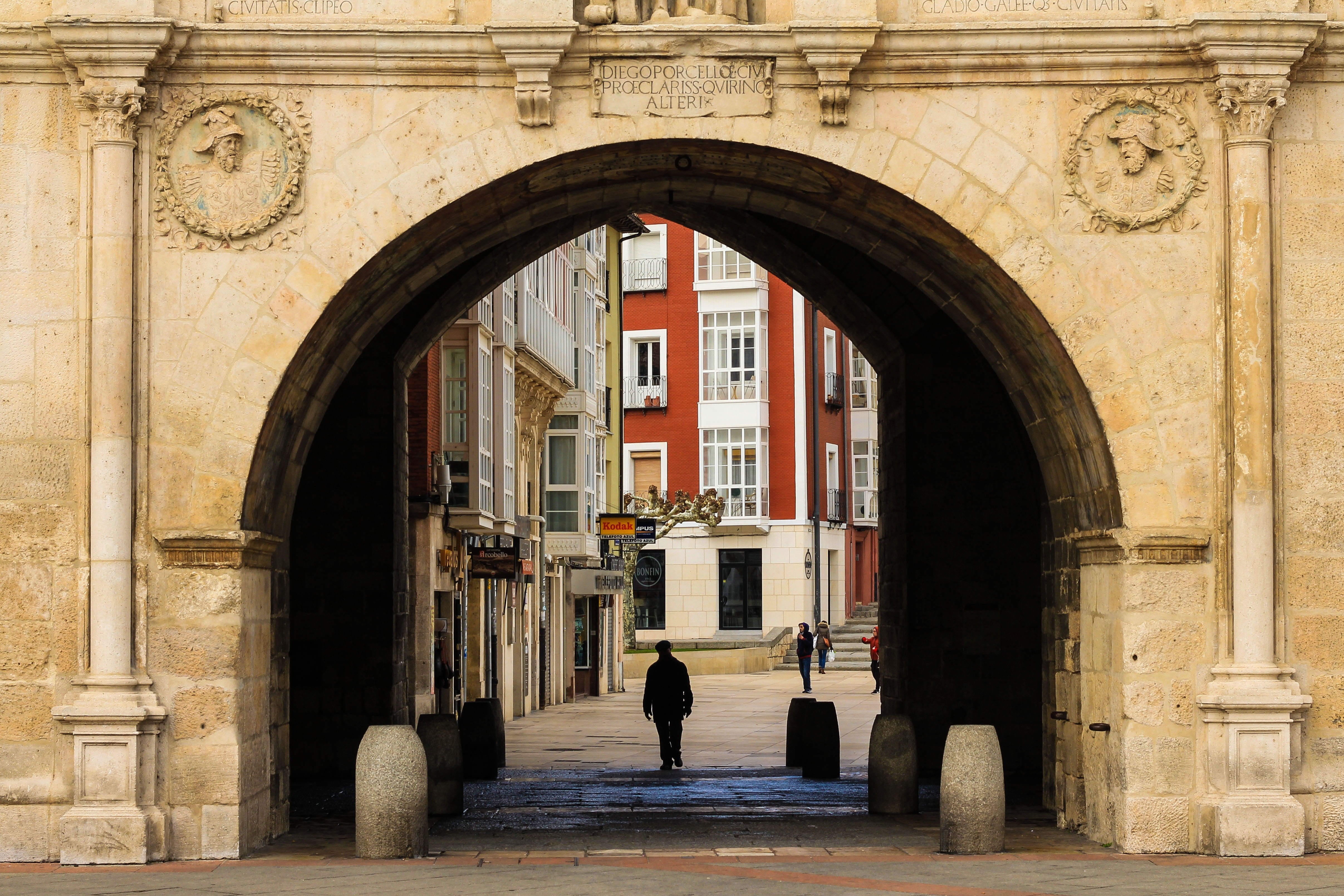 door, arched, columns, loneliness, photography, arcade, city of light, gothic, men, one person, history, real people, urban space, reference point, day, HD Wallpaper
