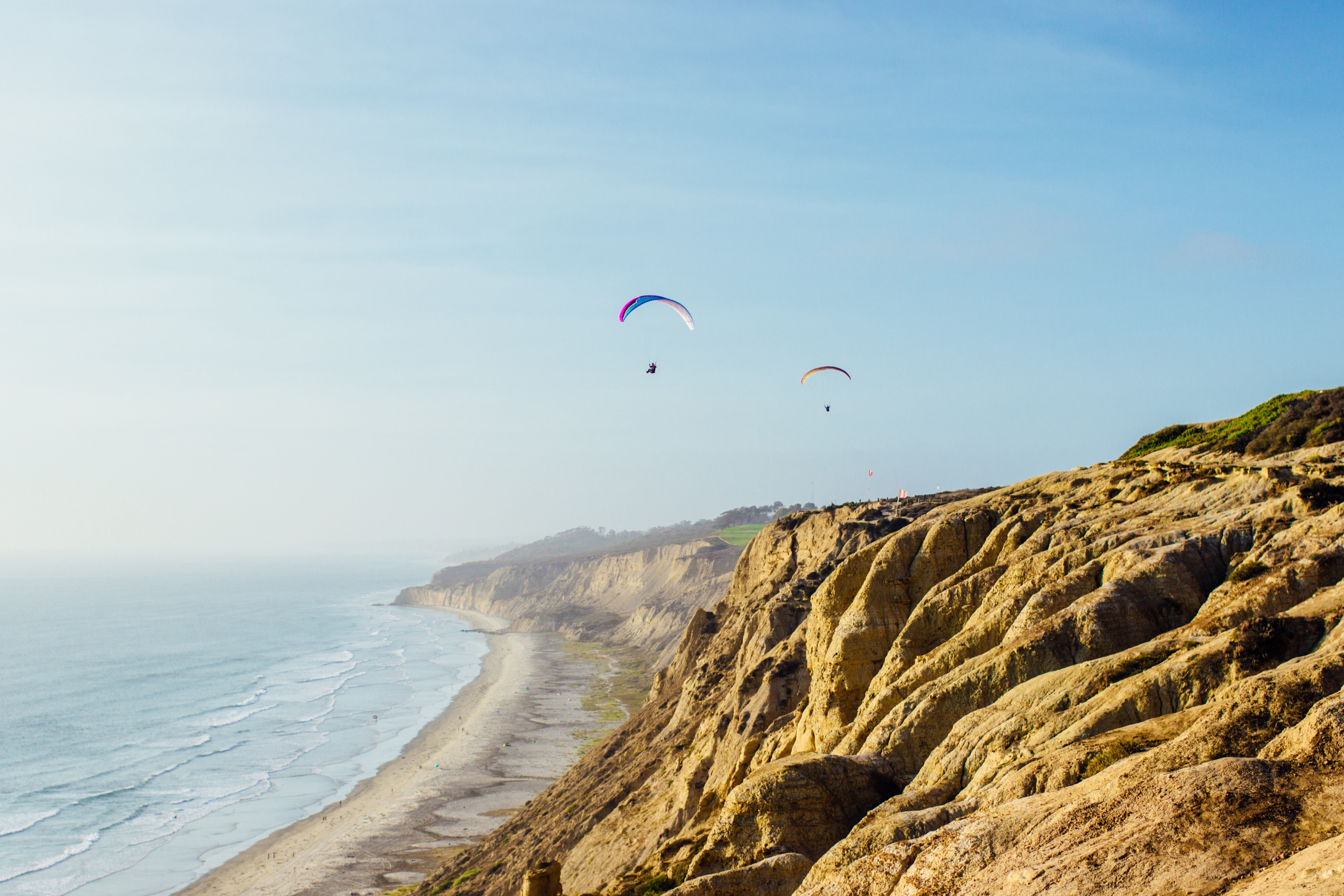 ocean, summer, water, rock - object, wild, land, leisure, activity, beauty in nature, shore, recreational Pursuit, tropical, parasail, extreme, sport, life, HD Wallpaper