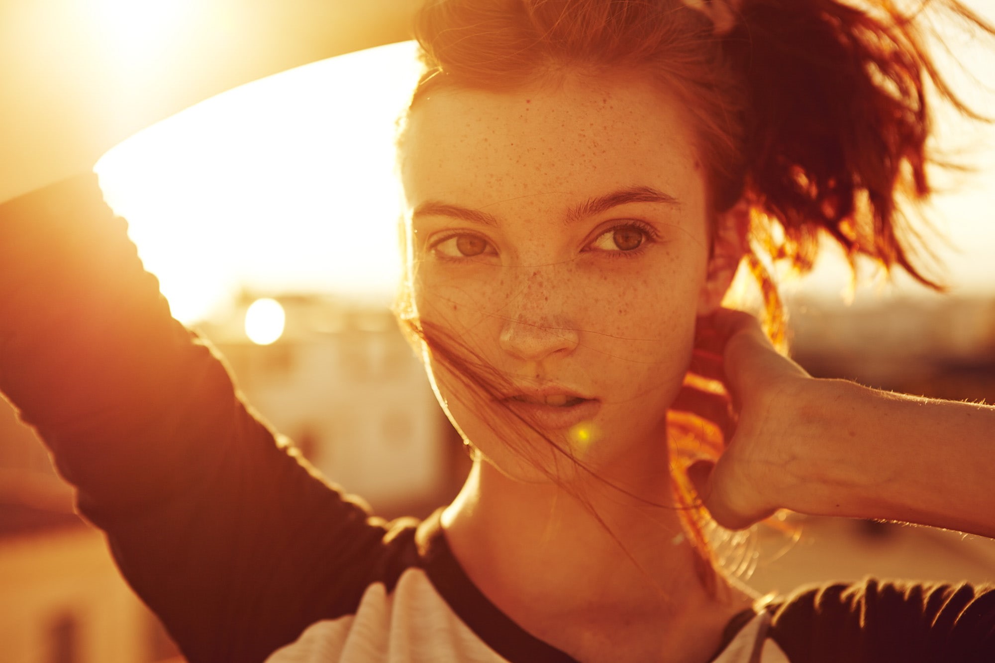 women, looking away, sun rays, 1080P, Hannah Masi, model, backlighting, women outdoors, redhead, portrait, hair in face, sunset, freckles, holding hair, HD Wallpaper