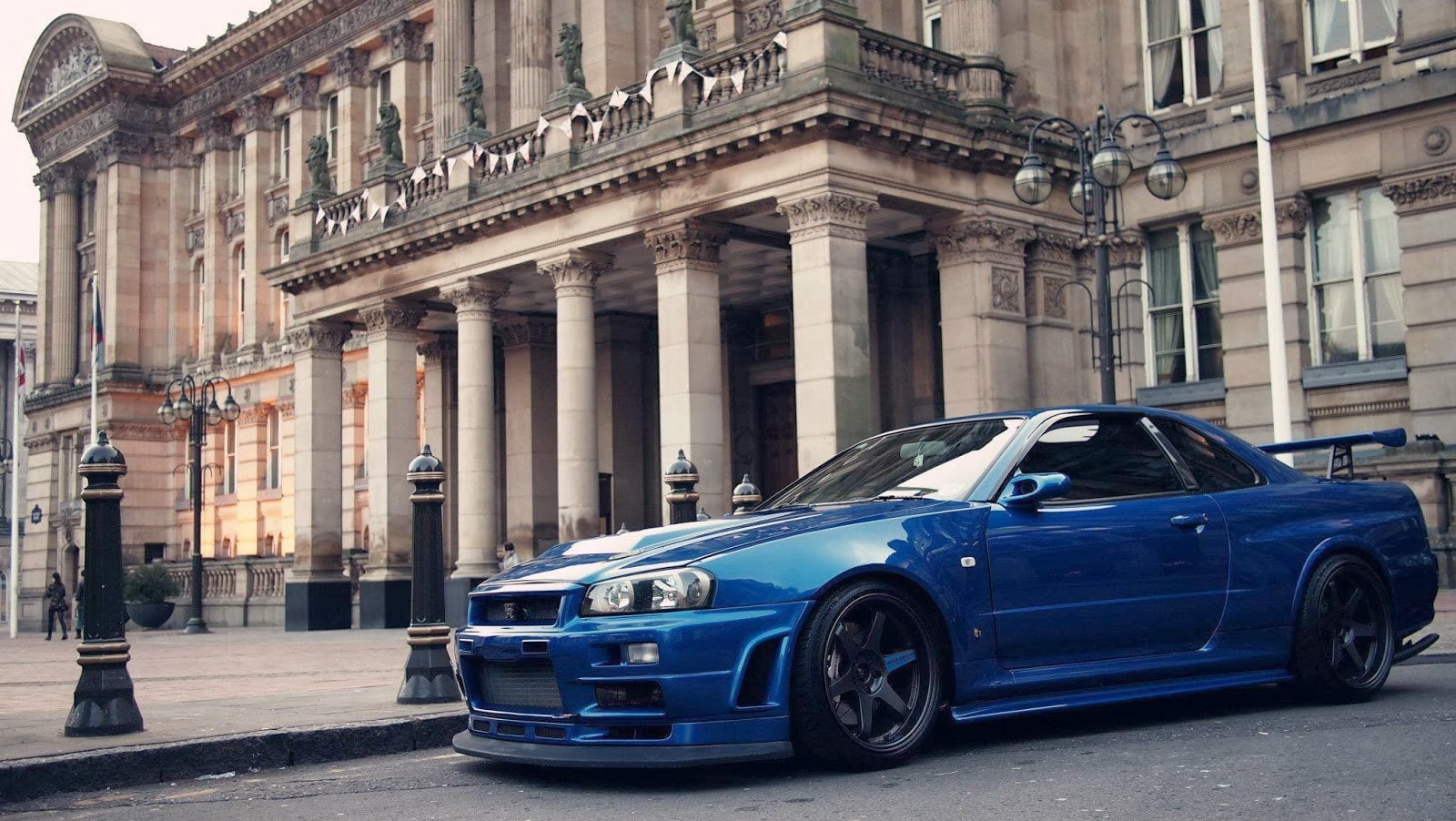 Nissan Skyline GT-R R34, 720P, bnr34, transportation, motor vehicle, car, the past, day, city, road, street, mode of transportation, land vehicle, history, HD Wallpaper