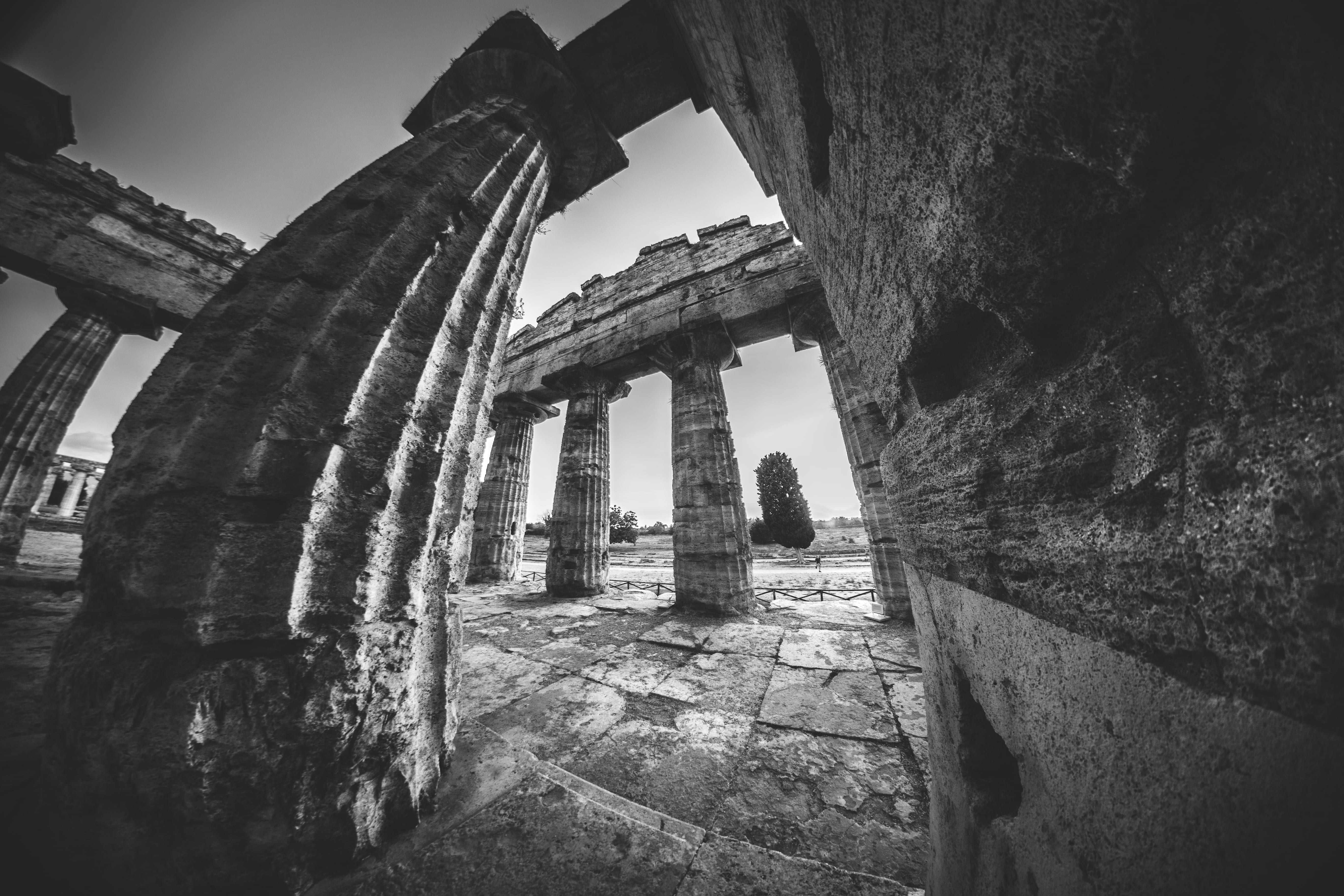 grayscale, archaeology, the past, weathered, sky, broken, pillar, 5K, pillars, deterioration, ancient, rock, bad condition, ruins, view, outdoors, damaged, HD Wallpaper