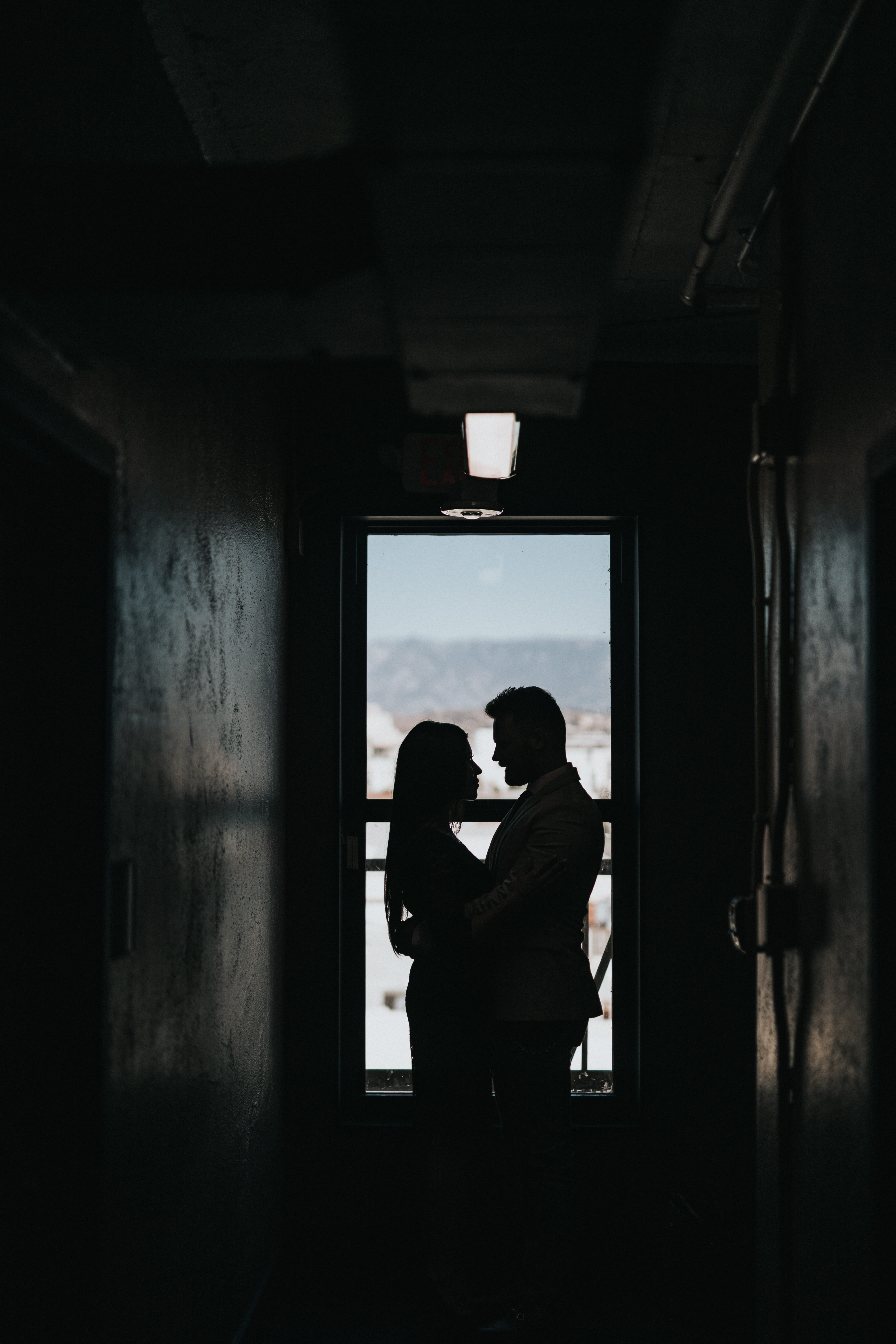 hugging, day, photography, woman, room, inside, architecture, indoors, real people, men, building, 5K, built structure, positive emotion, bonding, full length, Phone HD Wallpaper
