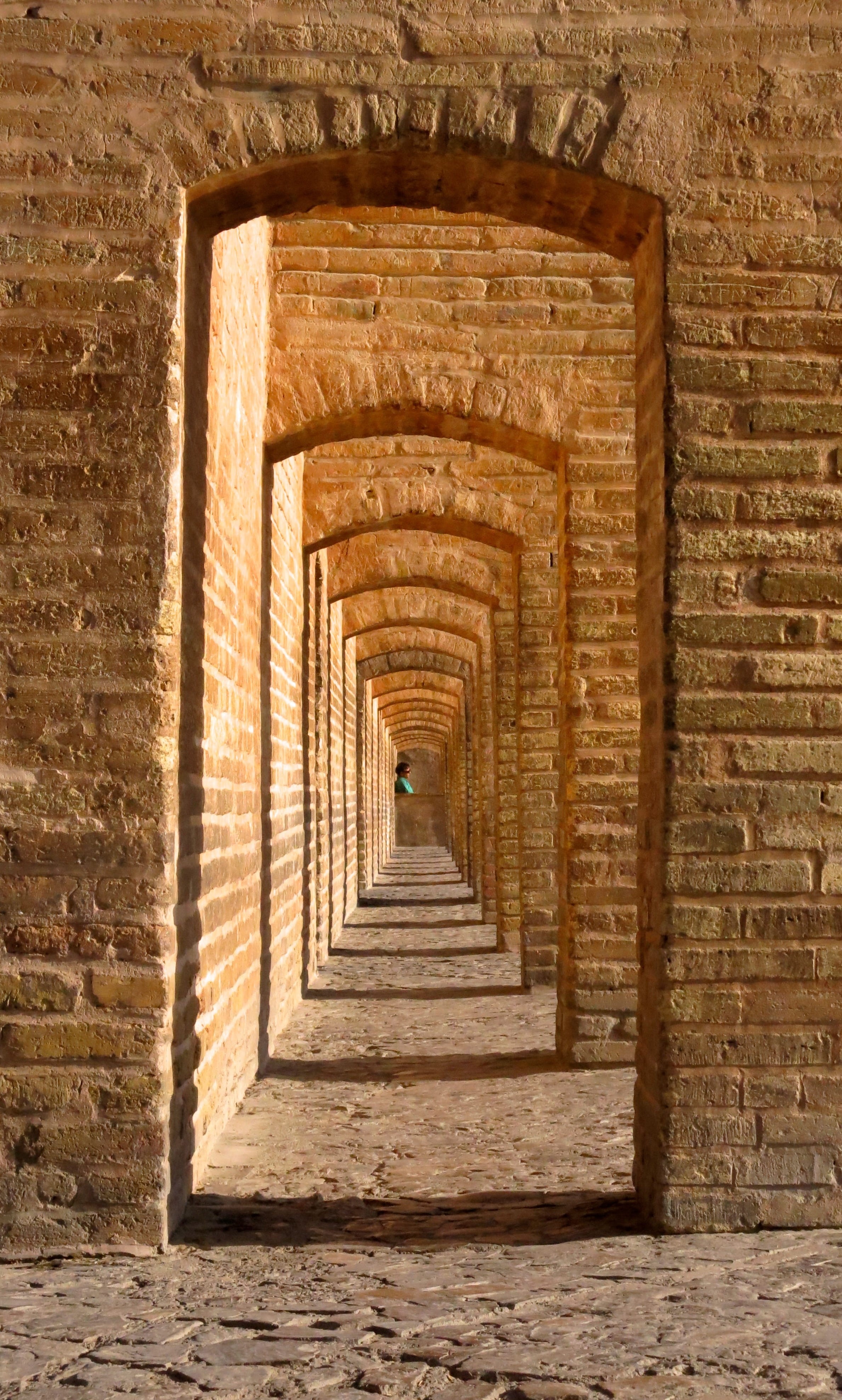 wall - building feature, direction, relax, arch, building exterior, 4K, built structure, the way forward, brick, sun, gate, travel destinations, ancient history, Phone HD Wallpaper