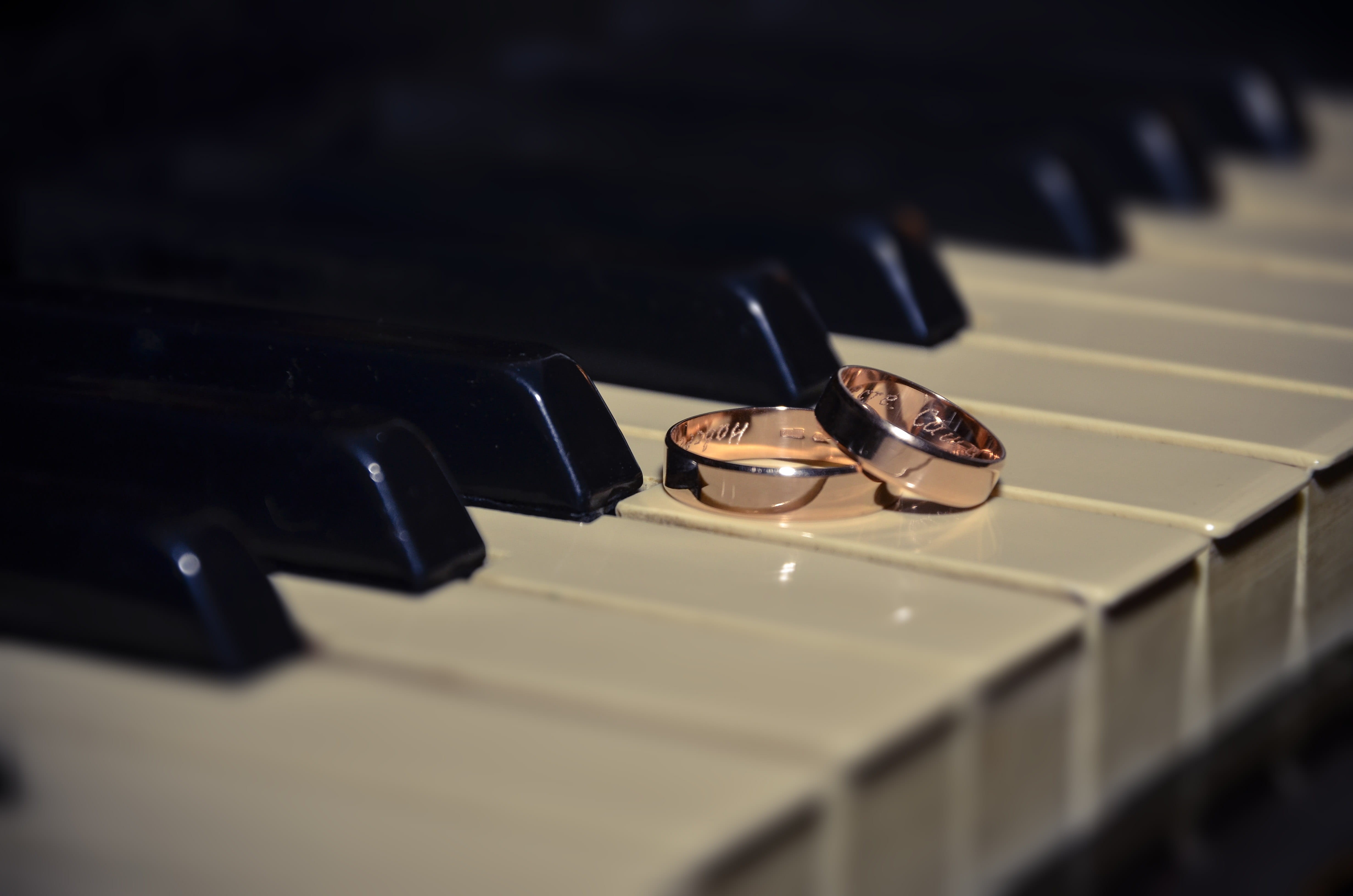 keys, jewelry, high angle view, close-up, pink, colored, placed, 4K, black color, wedding rings, indoors, pairs, wedding, ceremony, musical equipment, HD Wallpaper