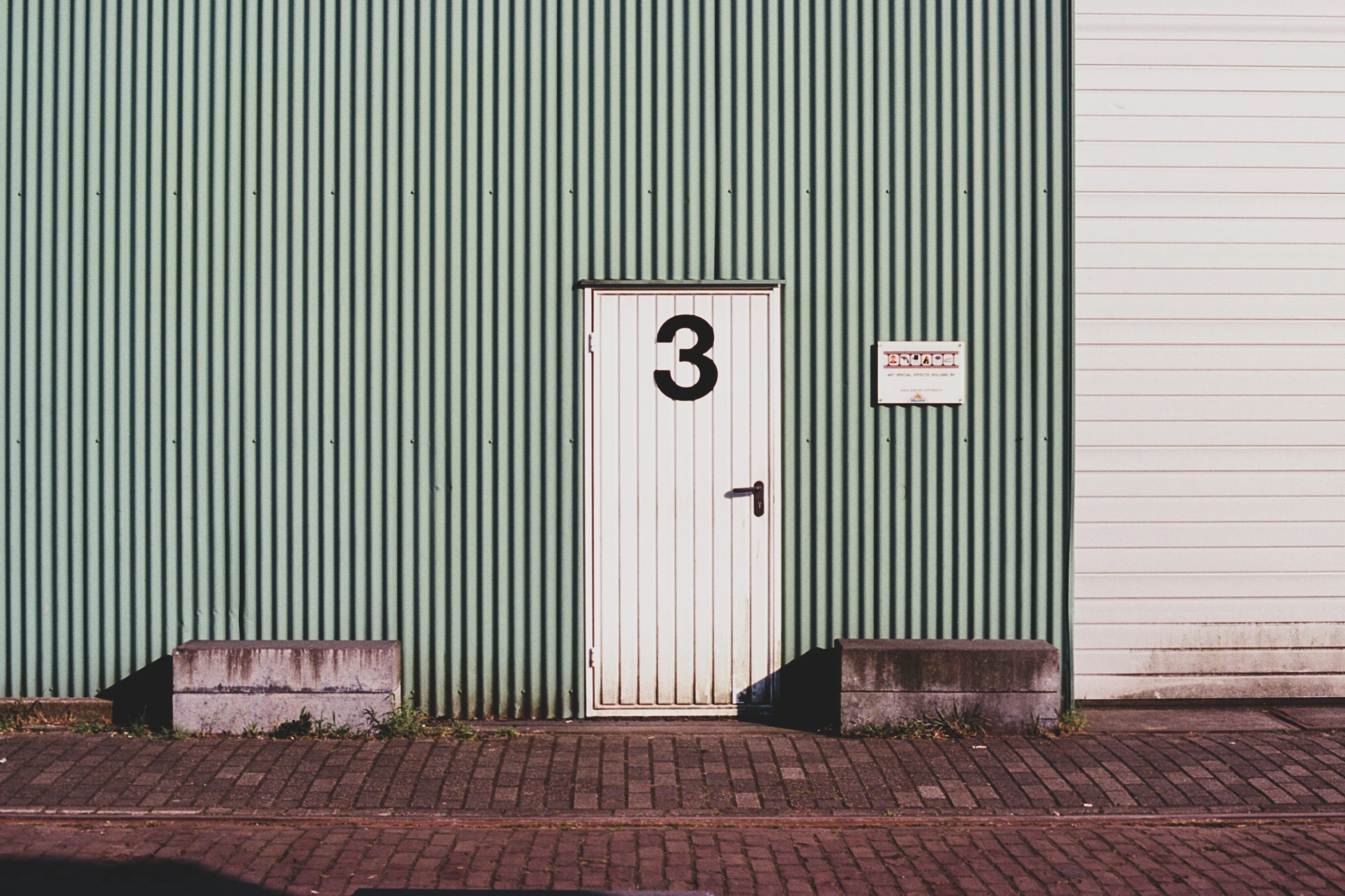 sun, brown, garage, three, entrance, metal, no people, day, bricks, pattern, 2K, white, door, corrugated, road, sign, wall - building feature, sidewalk, HD Wallpaper