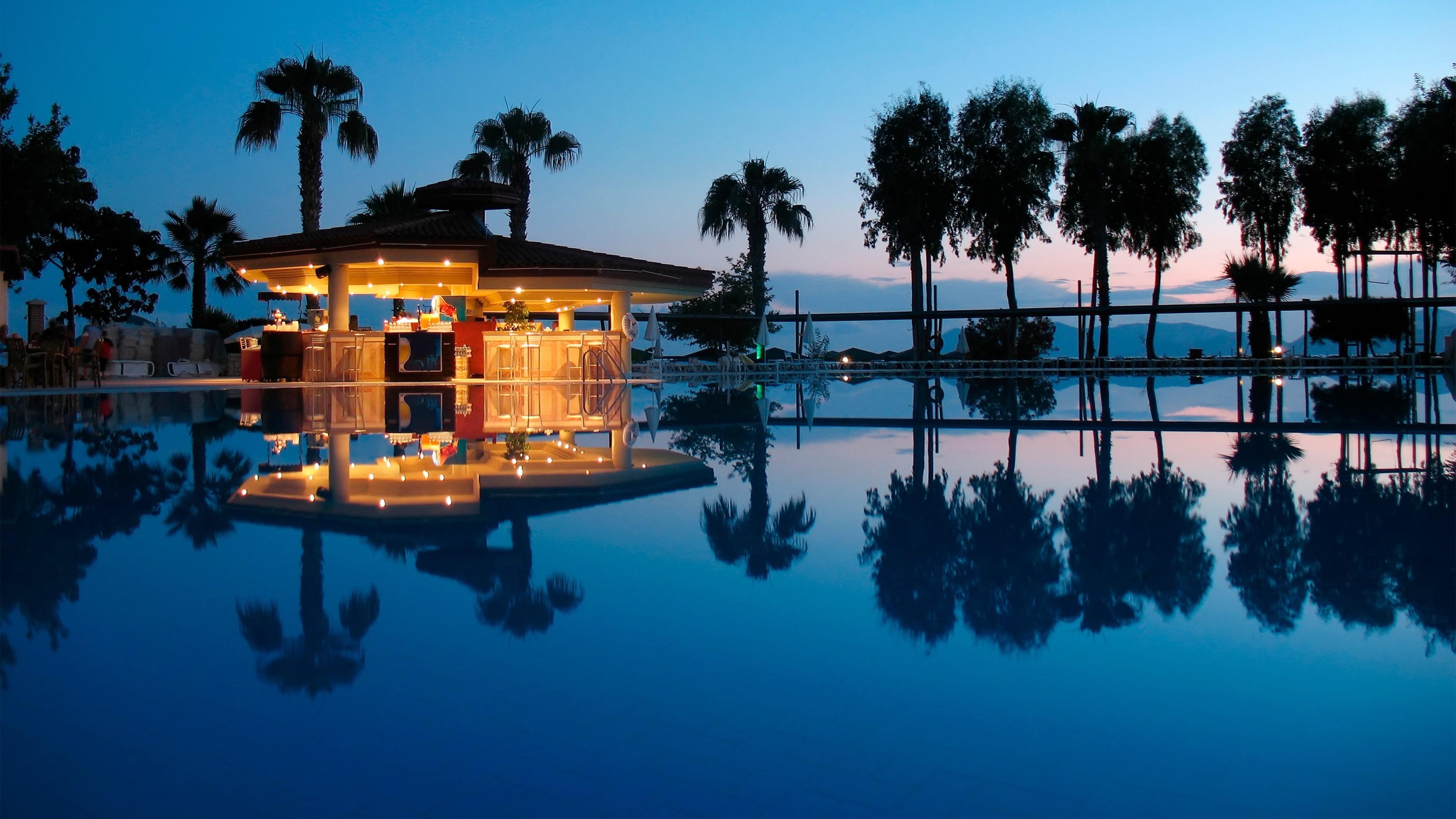 property, hotel, lighting, palm trees, evening, tropical bar, leisure, dusk, tree, vacation, swimming pool, water, mountains, reflection, pool, 4K, sky, HD Wallpaper